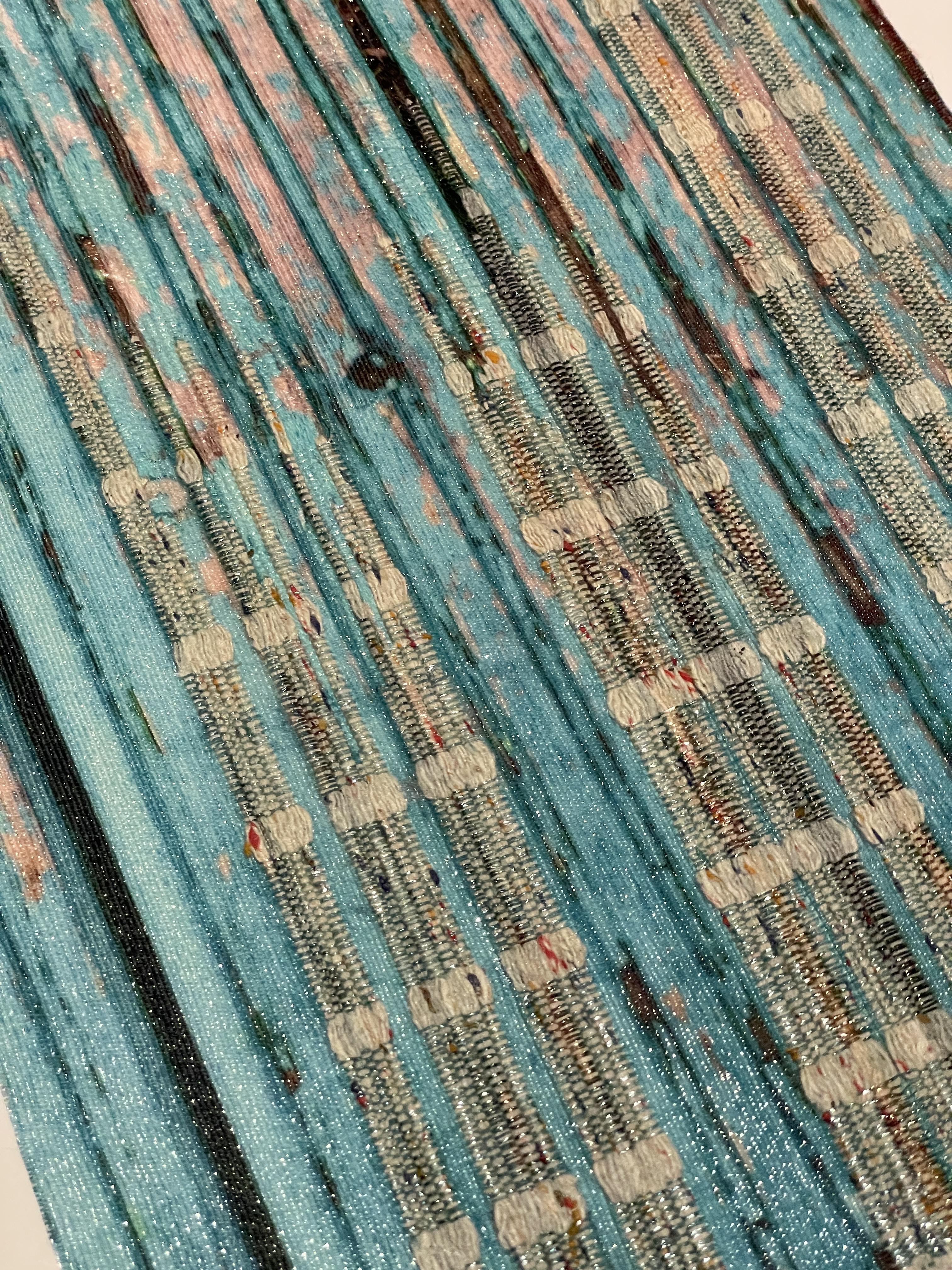slubbed cotton and polyester stripes with heat transfer print. Print doesn't take to exposed cotton areas.