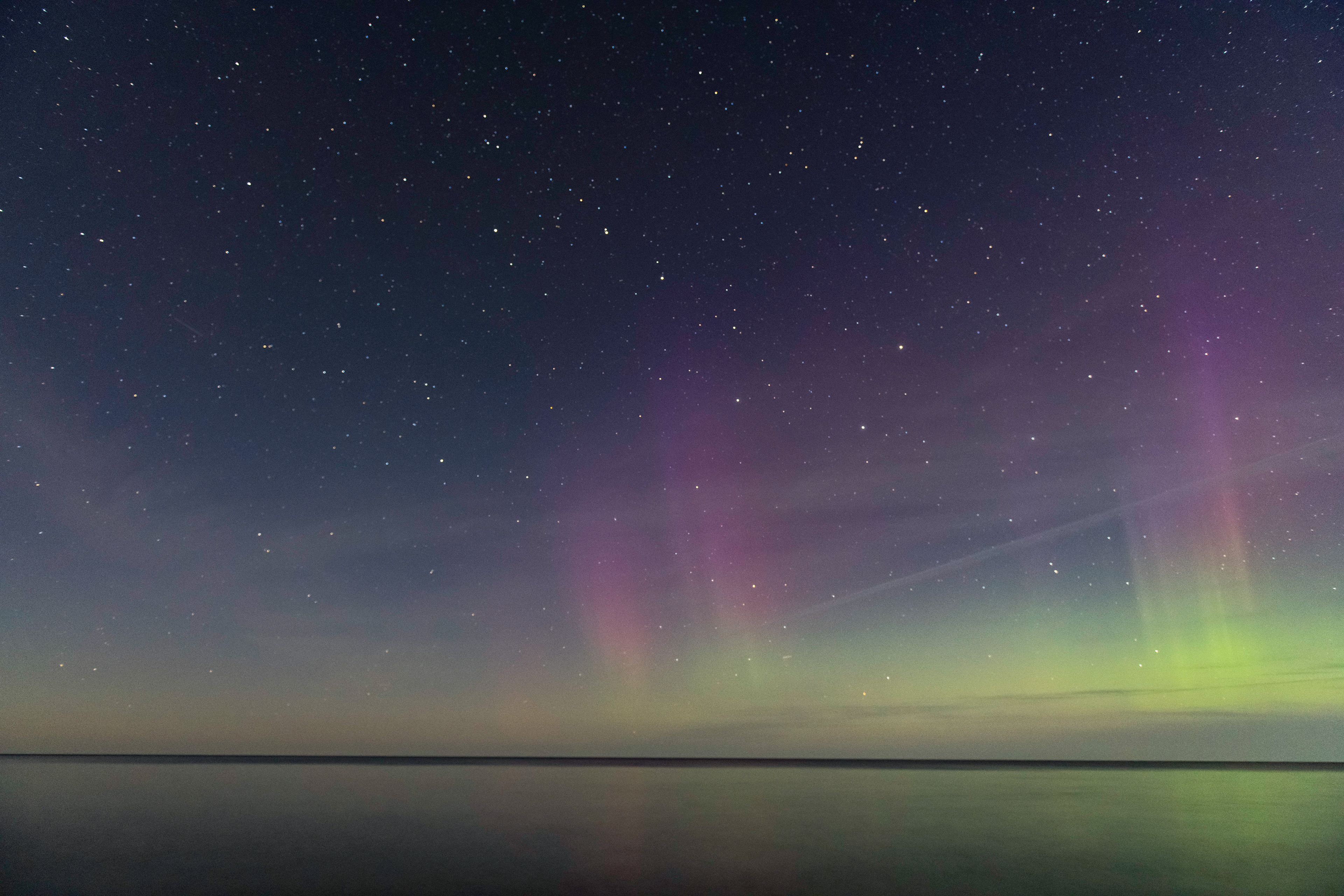 Aurora borealis over Lake Superior and Pictured Rocks Nat'l Lakeshore