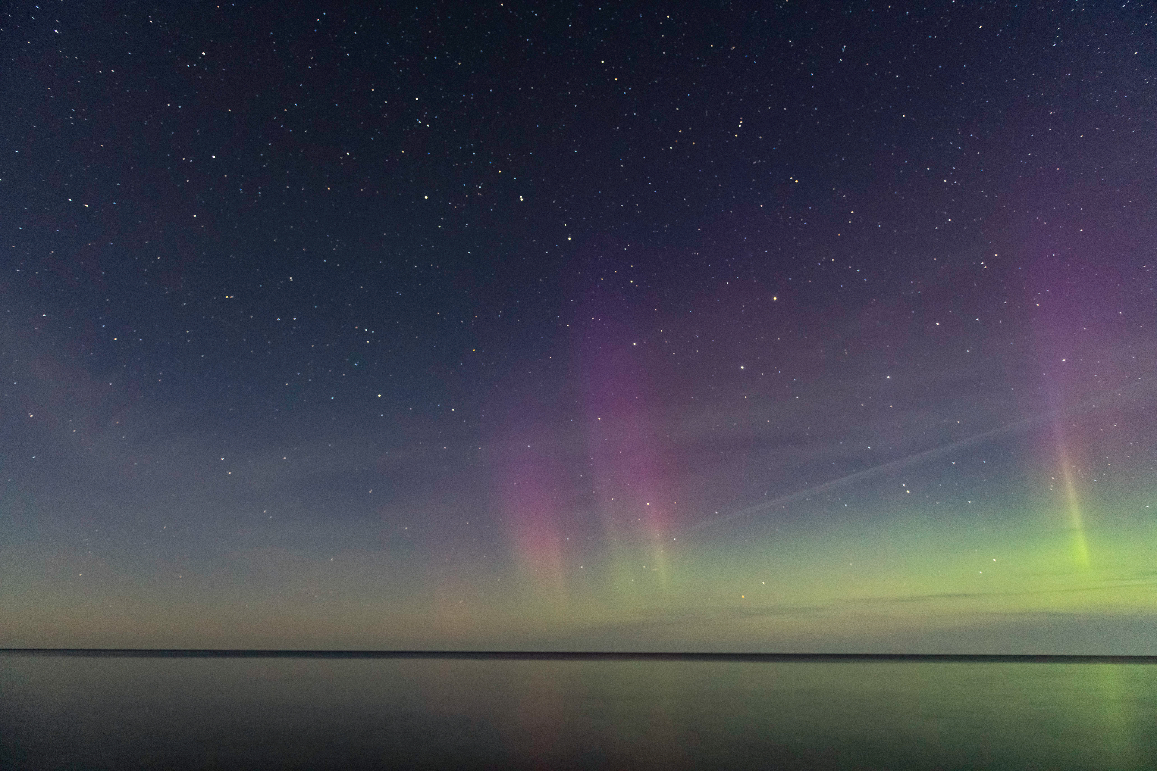 Aurora borealis with Canis major over Lake Superior and Pictured Rocks Nat'l Lakeshore