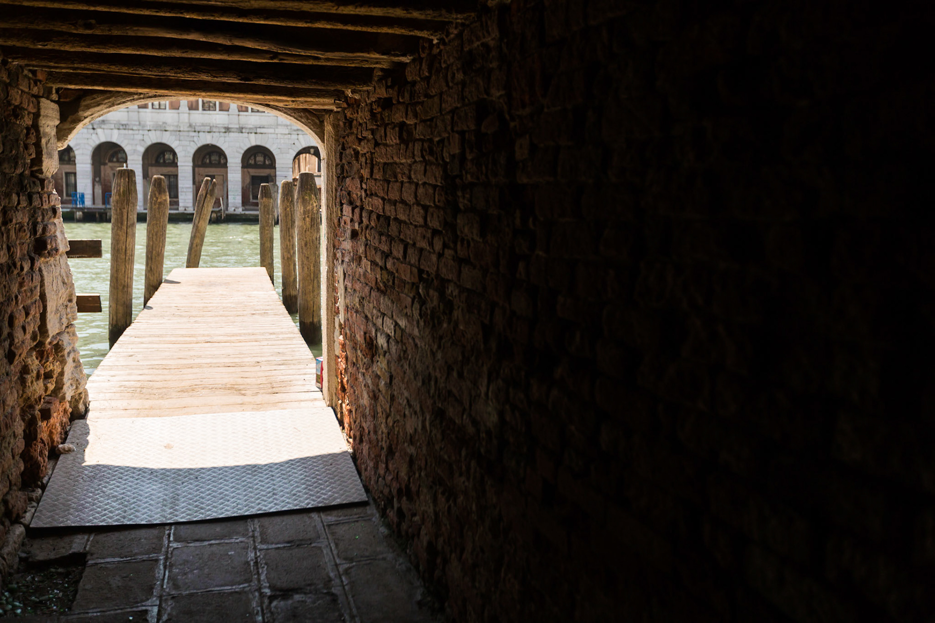 Alley way to the Grand Canal in Venice, Italy.