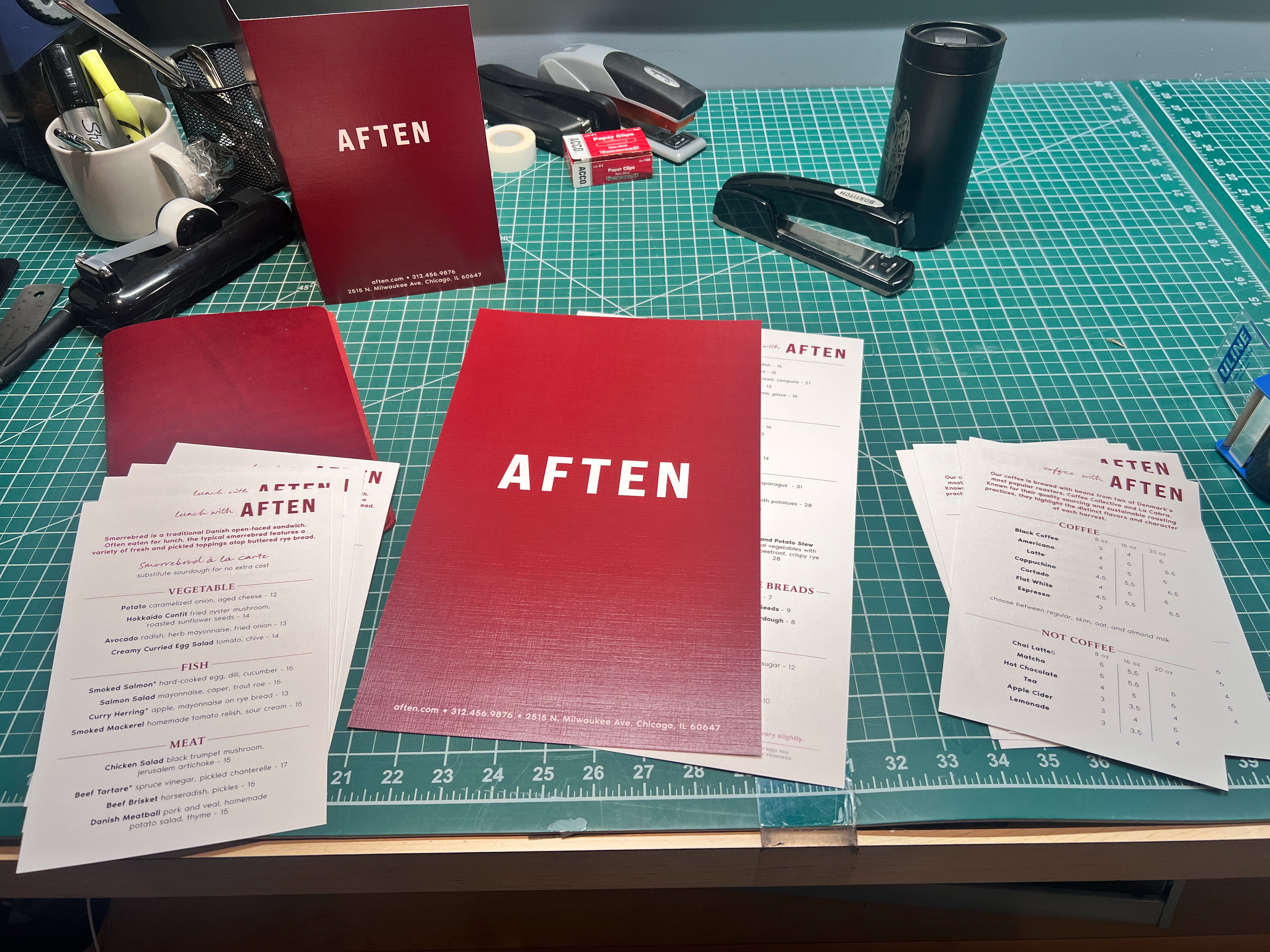 The menus printed and cut. I later reprinted the dinner menu to use the logo with "Aften danish kitchen"