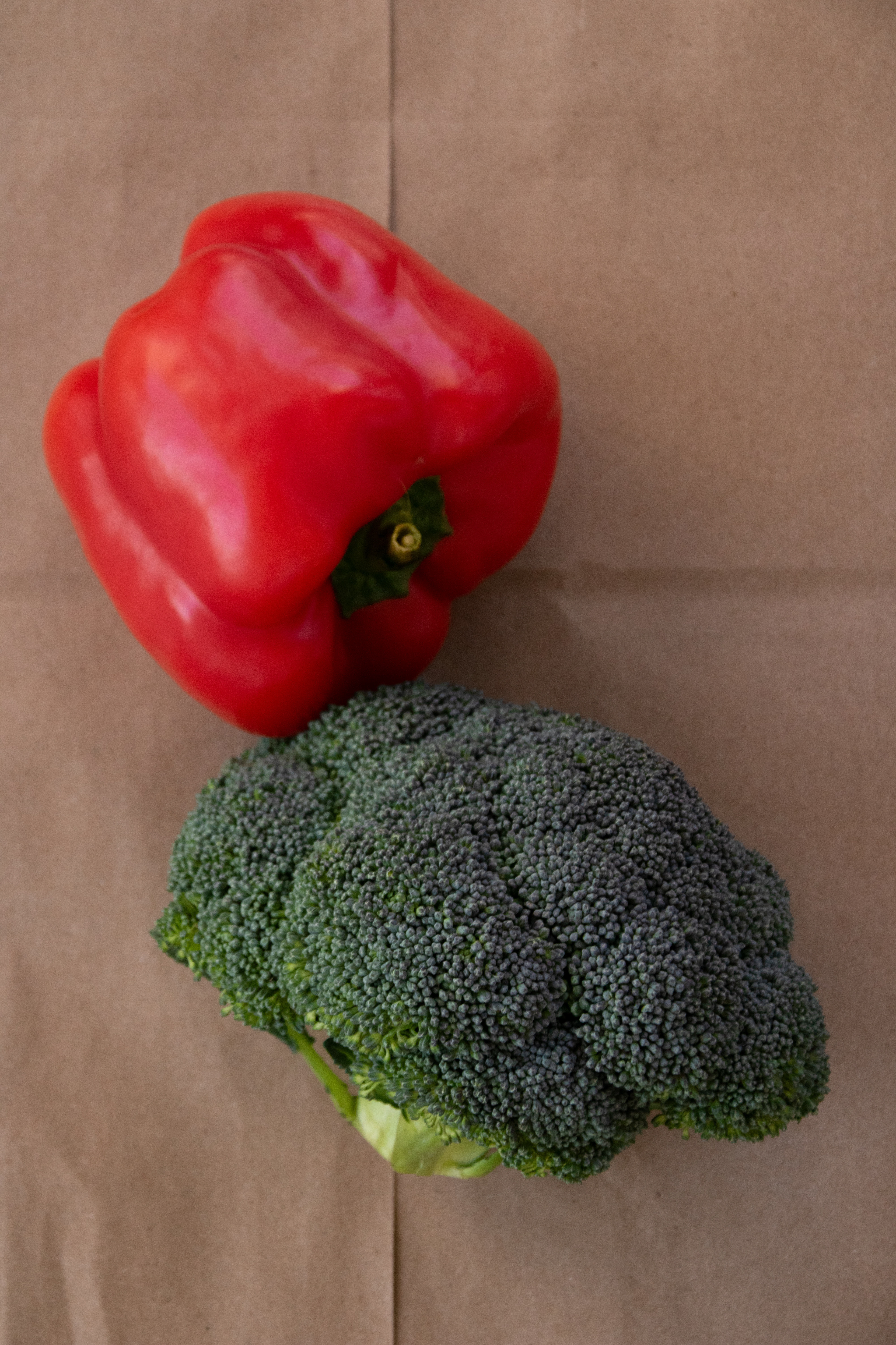 I took many photos of the pepper and broccoli separately, but decided to combine them because three groups of items is more visually appealing on the poster than 1 item in all four corners.