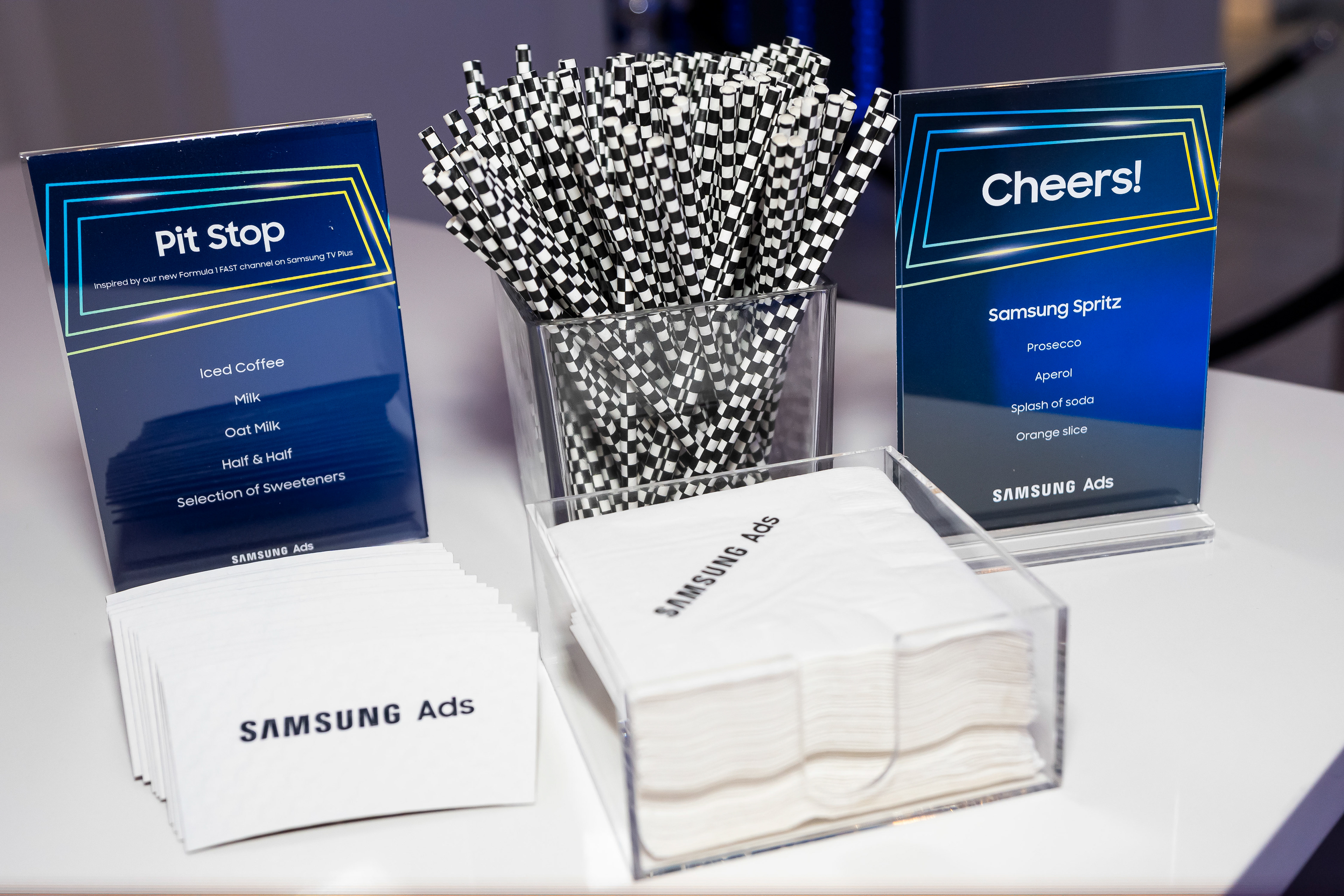 Branded event swag display with Samsung Spritz cards