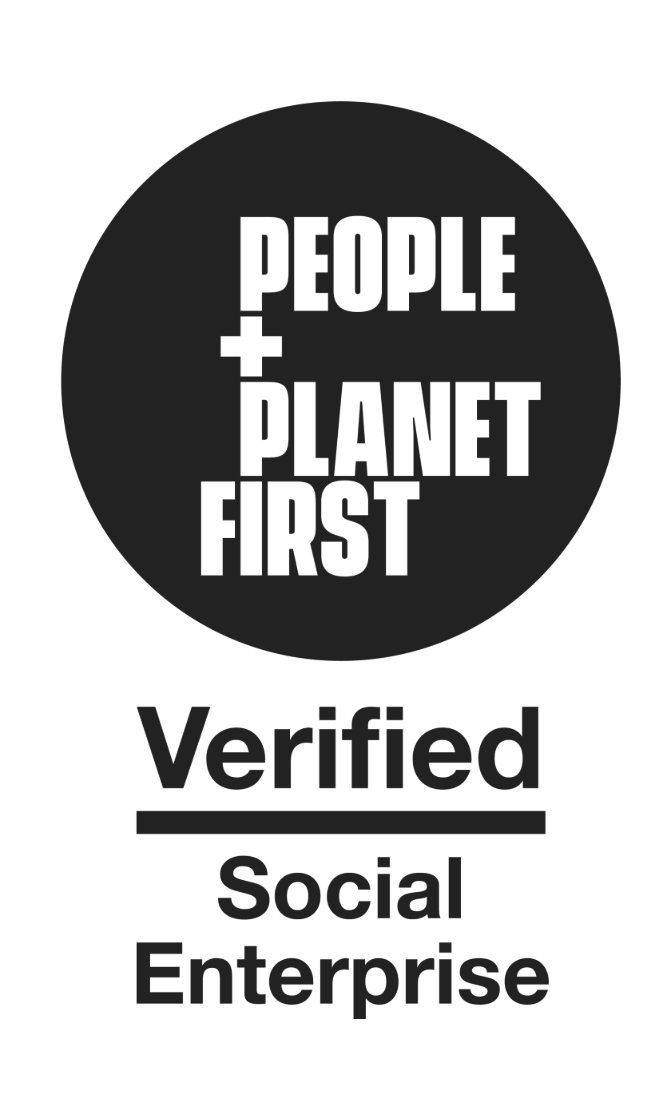 Badge confirming shakespeare at home is verified by people and planet first  and is listed has a verified social enterprise the badge is a black circle with people and planet first in white font the word and is symbolised using the plus sign instead of the word and. Underneath in black font is the word verified with a black dividing line under which are the words social enterprise. 