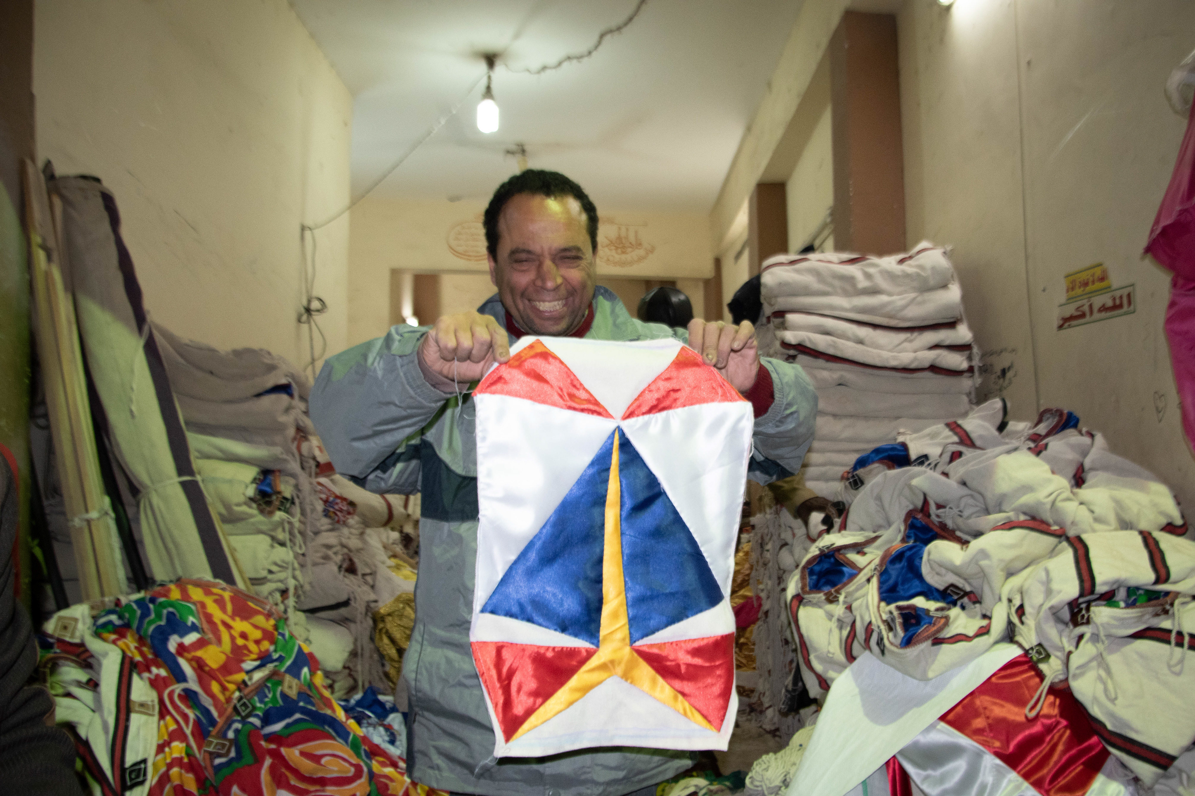 Tent maker showing finished scale model