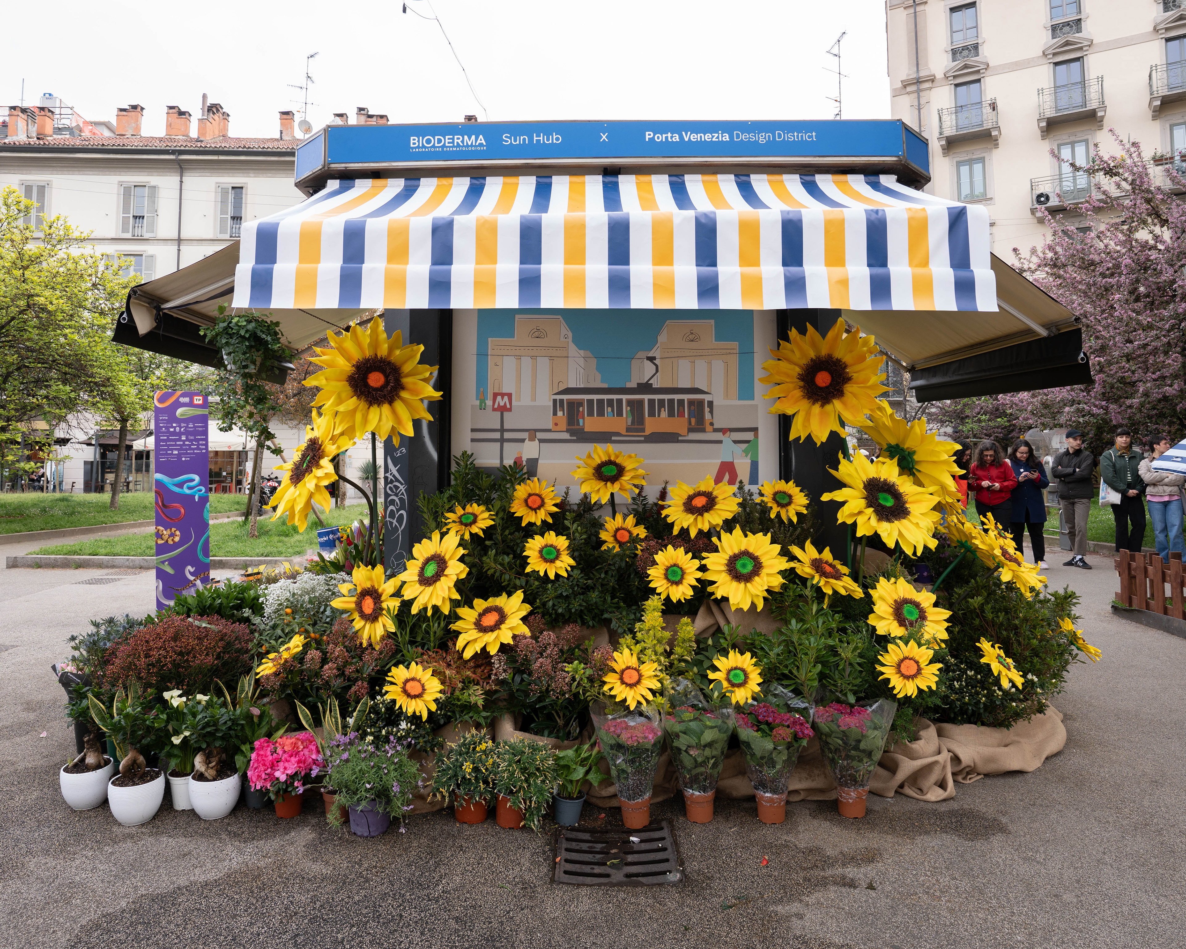 Illustrazione collage di Helga Aversa che rappresenta i luoghi iconici di Porta Venezia per Bioderma Sun Hub, Milano Design Week stand visual campagna