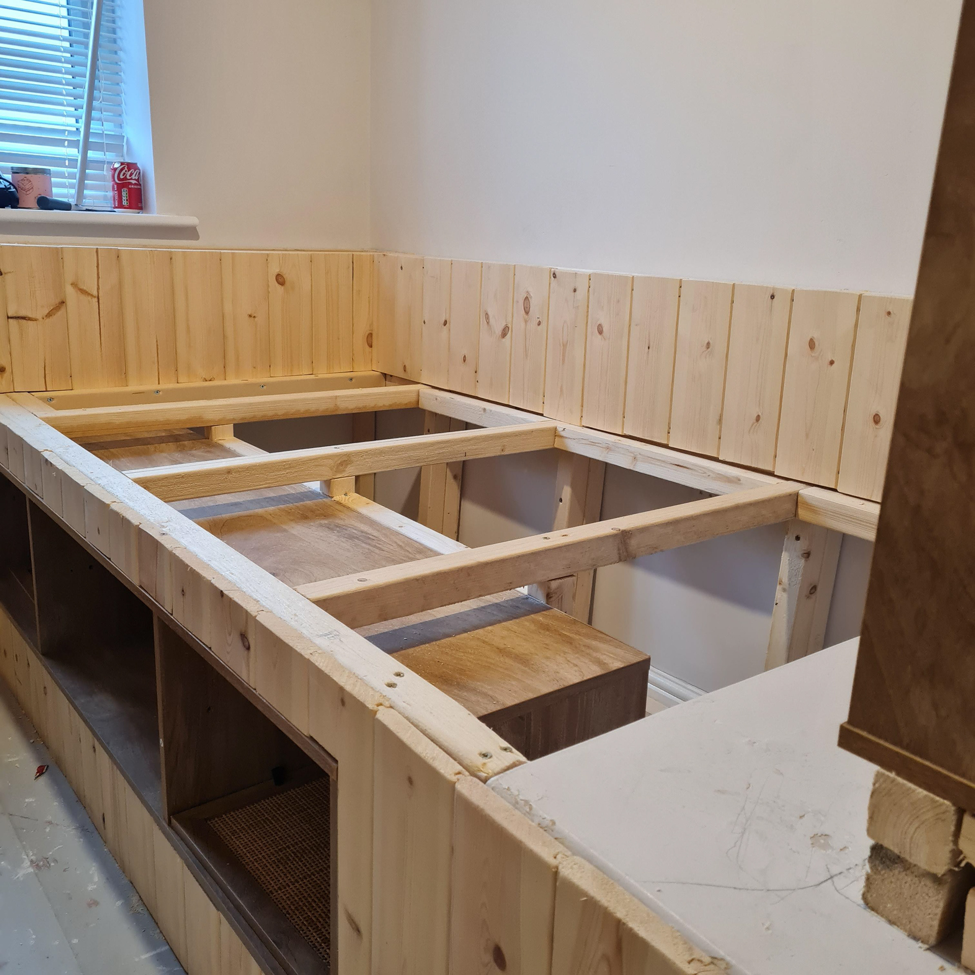 Adding the frame, with loads of storage underneath.