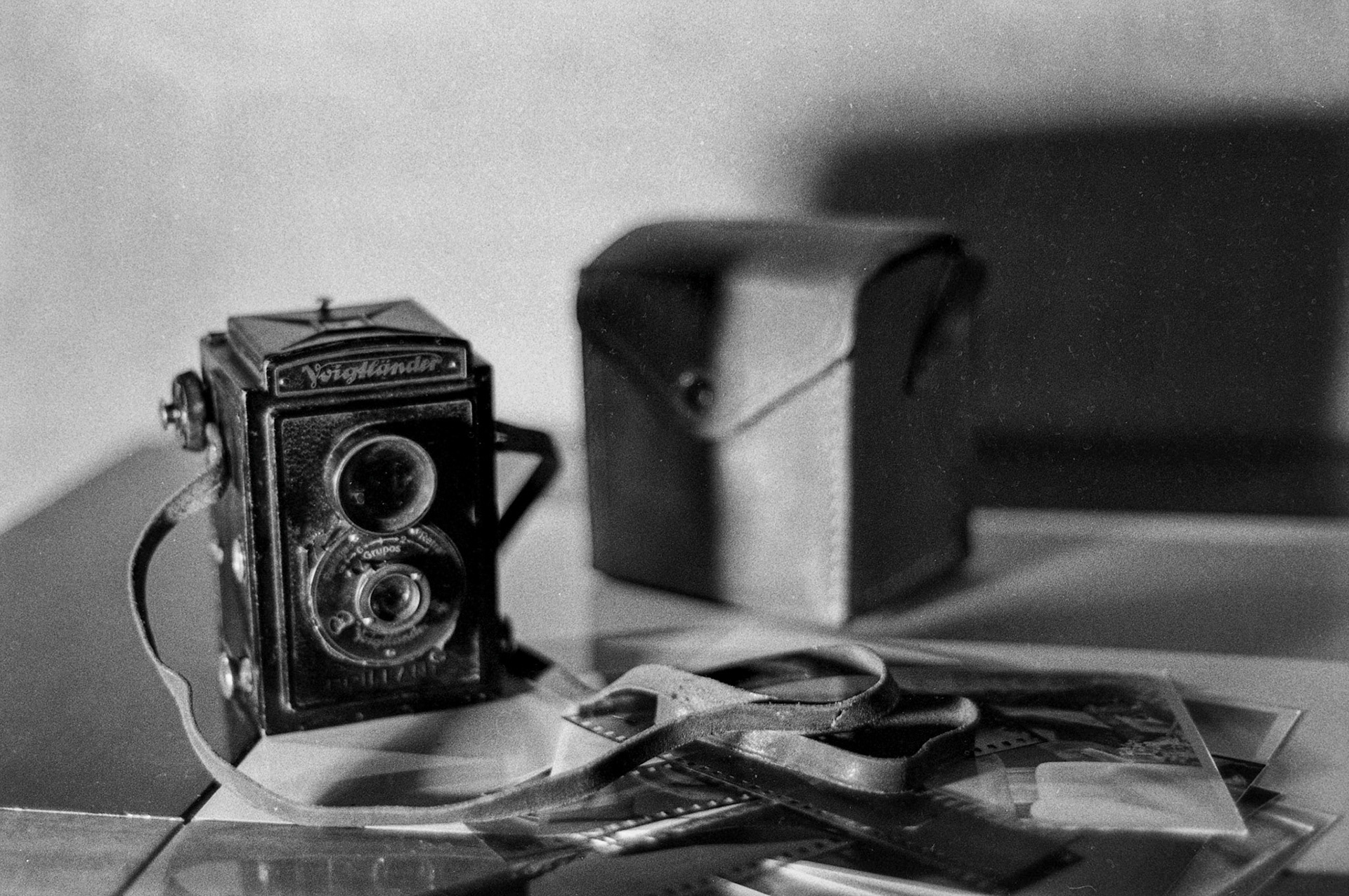 Composition with and old broken camera my mother bought for me in Argentina