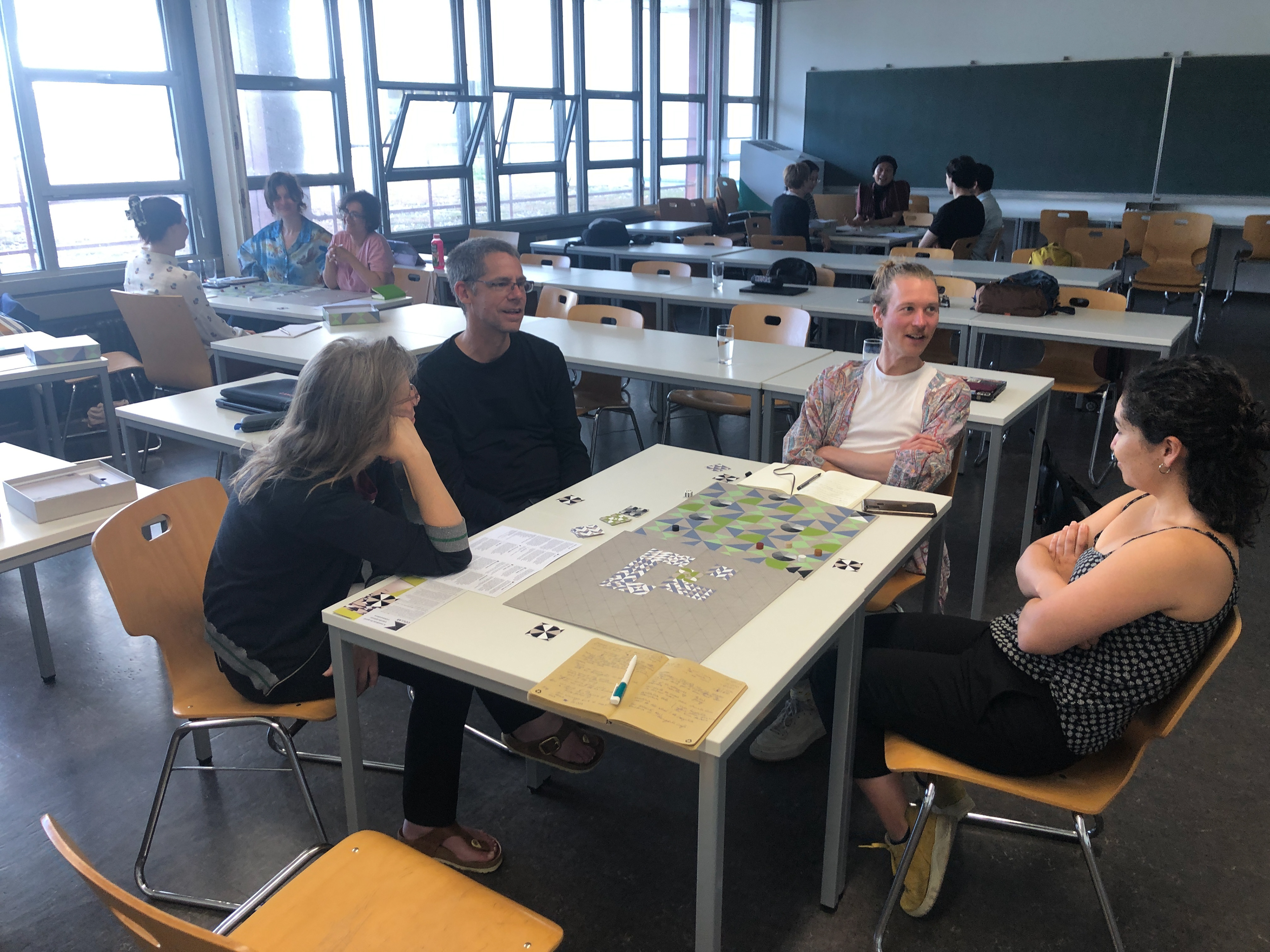 Participants play Collab, a game for interdisciplinary reflection