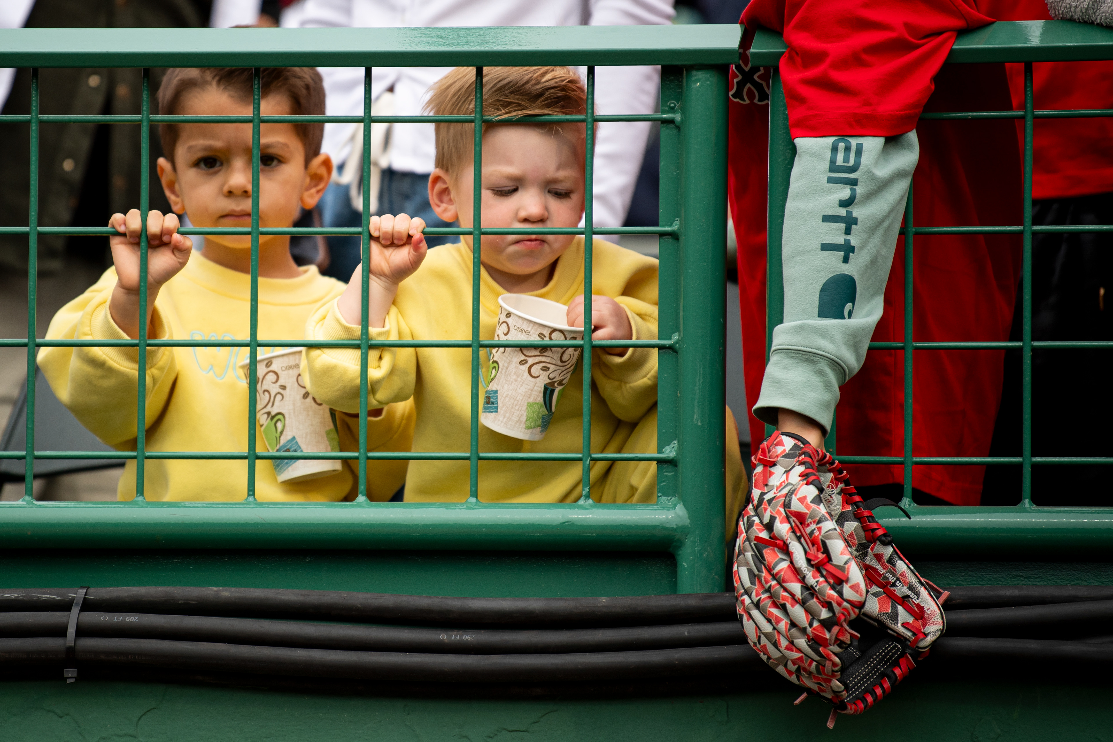 May 23, 2026, Boston, MA: Sons of Connor Wong #12 of the Boston Red Sox look on as their father warms up in the bullpen prior to a game against the Minnesota Twins at Fenway Park in Boston, Massachusetts Saturday, May 23, 2026. (Photo by Aiden Shertzer/Boston Red Sox)