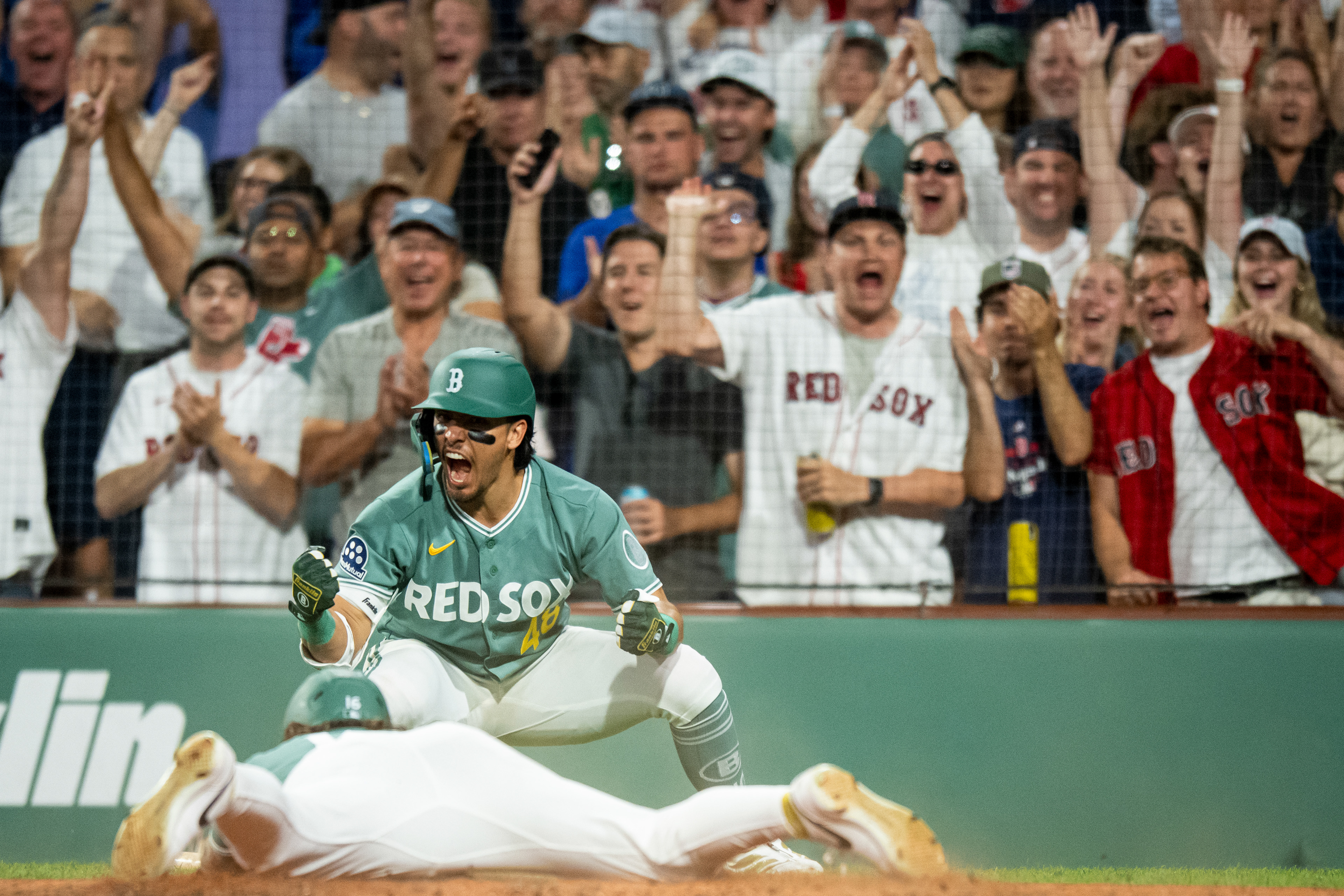 July 24, 2026, Boston, MA: Anthony Seigler #48 of the Boston Red Sox reacts to Jarren Duran #16 of the Boston Red Sox scoring during the eighth inning of a game against the Toronto Blue Jays at Fenway Park in Boston, Massachusetts Friday, July 24, 2026. (Photo by Aiden Shertzer/Boston Red Sox)