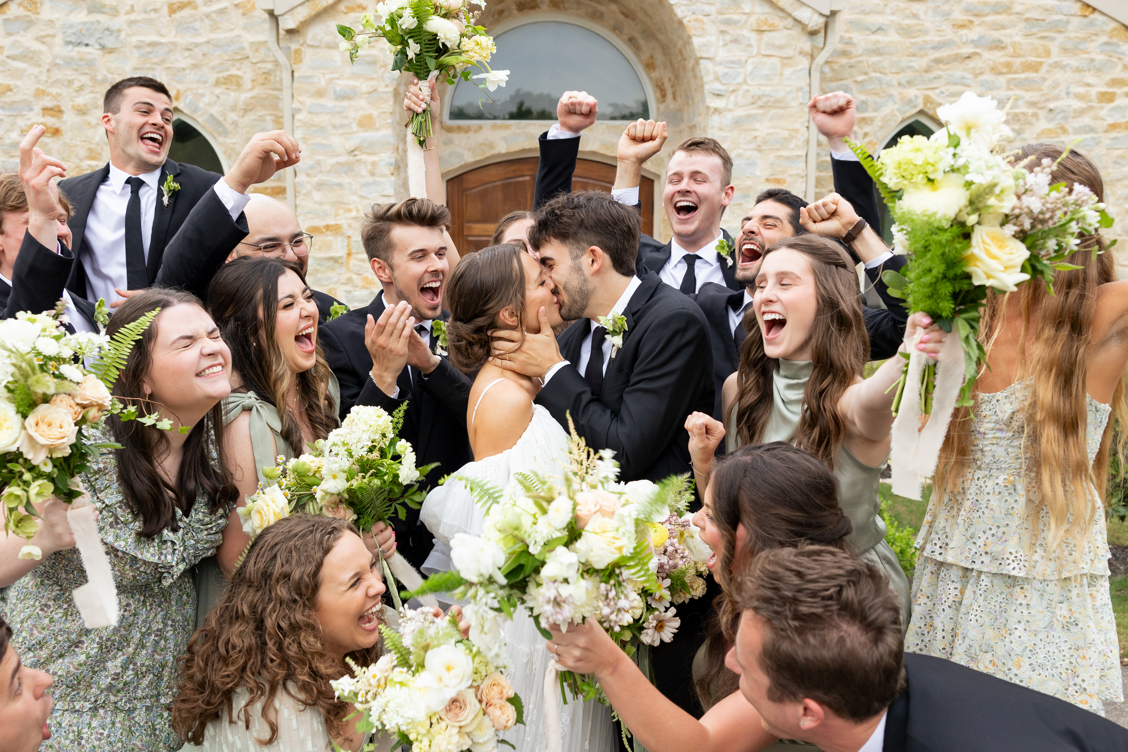 May 23, 2024, Waxahachie, TX: Newly weds Jake and Landry Taylor pose for a photo surrounded by their bridal party after their wedding ceremony at The Springs Waxahachie, in Waxahachie, Texas Thursday, May 23, 2024. (Photo by Aiden Shertzer)