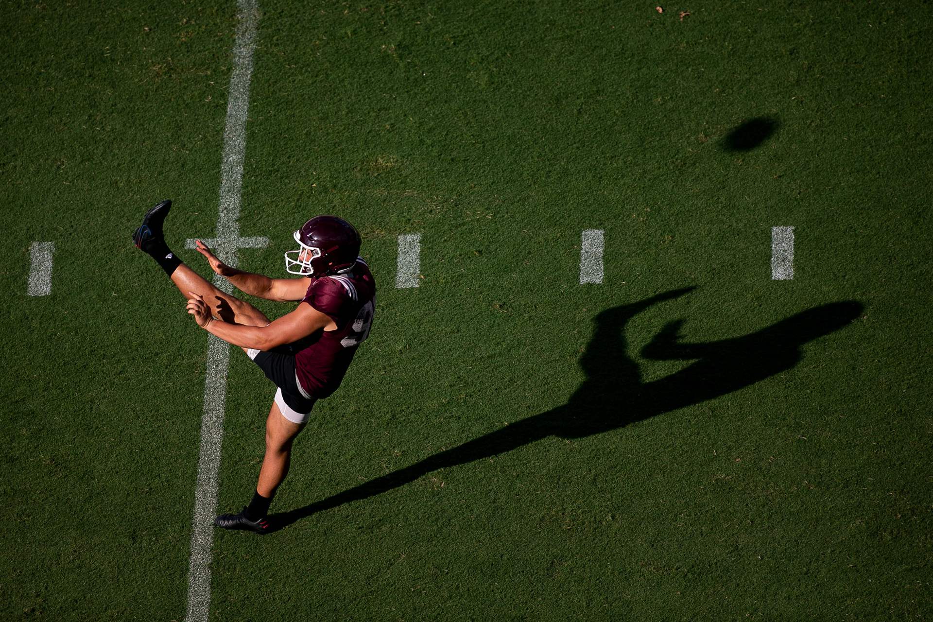 COLLEGE STATION, TX - August 07, 2022 - Punter Nik Constantinou #95 of the Texas A&M Aggies punts a football during a practice at Kyle Field in College Station, TX. Photo By Aiden Shertzer/Texas A&M Athletics