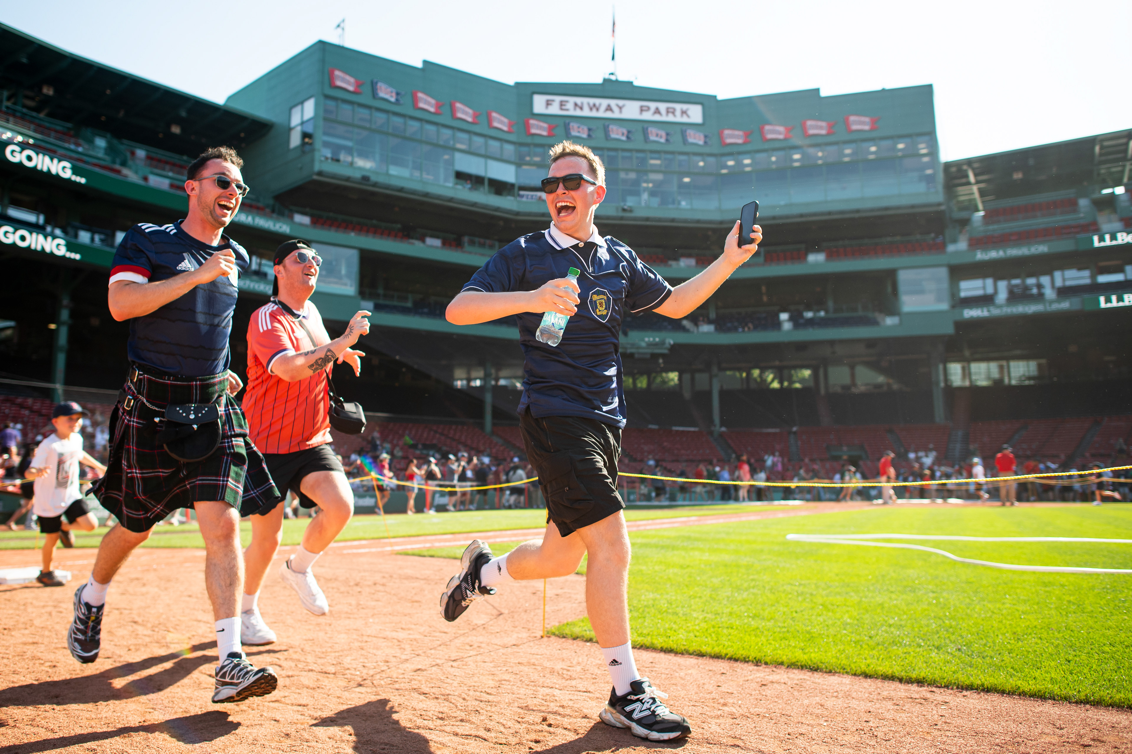 July 1, 2026, Boston, MA: Scottish fans round the bases during Kids Run the Bases after a game between the Washington Nationals and the Boston Red Sox at Fenway Park in Boston, Massachusetts Wednesday, July 1, 2026. (Photo by Aiden Shertzer/Boston Red Sox)