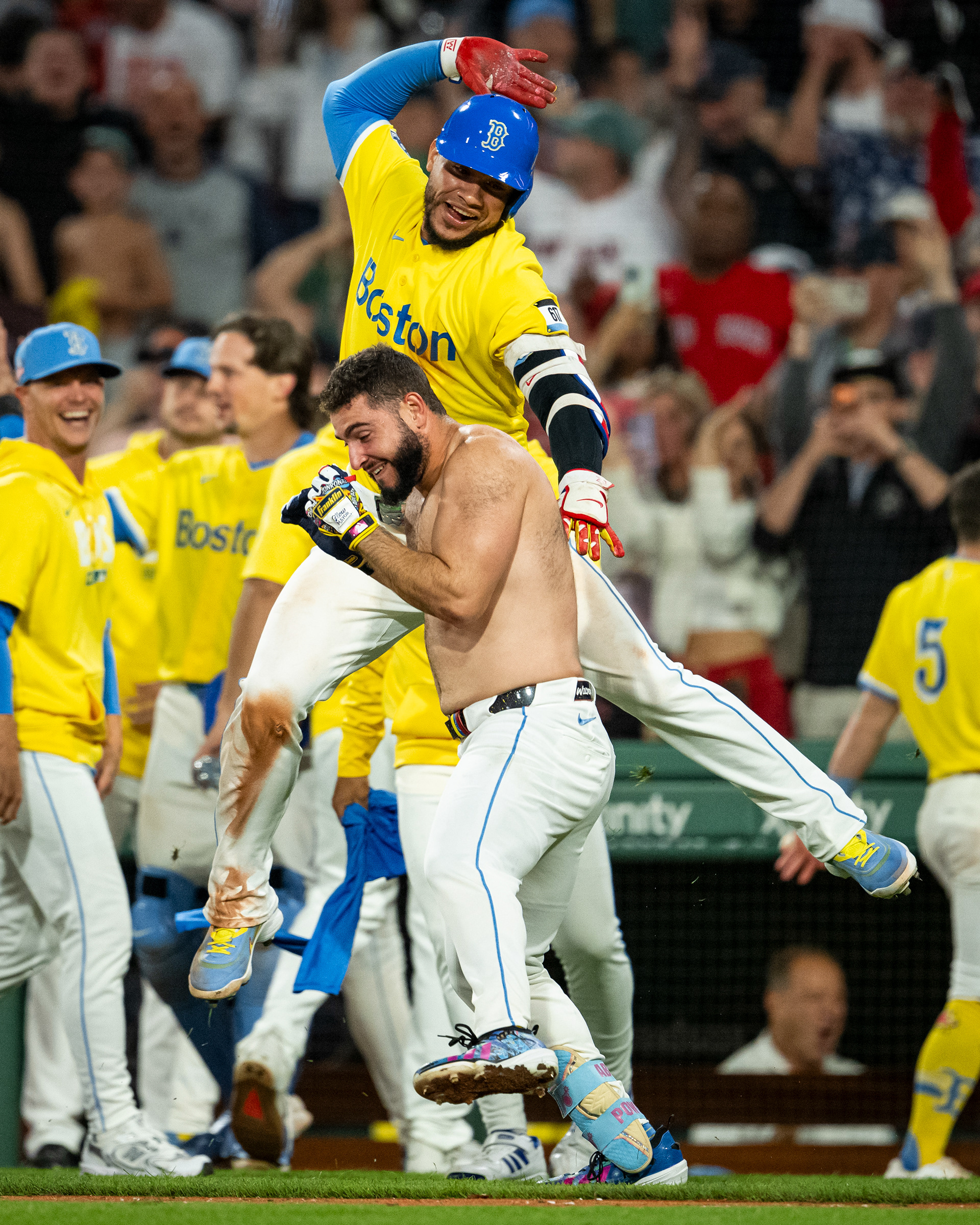 August 22, 2026, Boston, MA: Wilyer Abreu #52 of the Boston Red Sox reacts with Willson Contreras #40 of the Boston Red Sox after hitting into a fielder’s choice to walk it off during the ninth inning of a game against the San Francisco Giants at Fenway Park in Boston, Massachusetts Saturday, August 22, 2026. (Photo by Aiden Shertzer/Boston Red Sox)