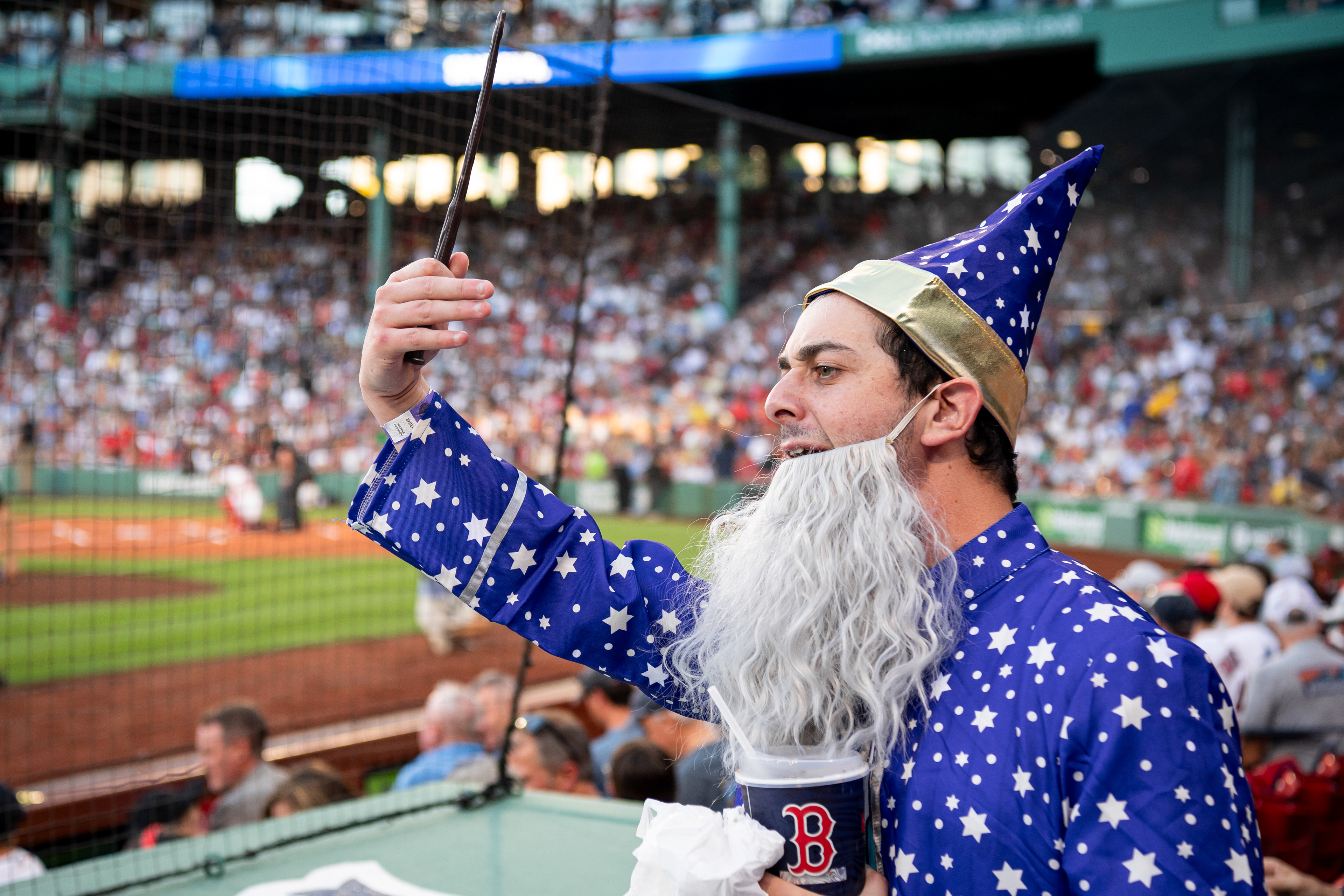 August 4, 2026, Boston, MA: A fan dressed as a wizard reacts with Chicago White Sox players prior to a game against the Boston Red Sox at Fenway Park in Boston, Massachusetts Tuesday, August 4, 2026. (Photo by Aiden Shertzer/Boston Red Sox)