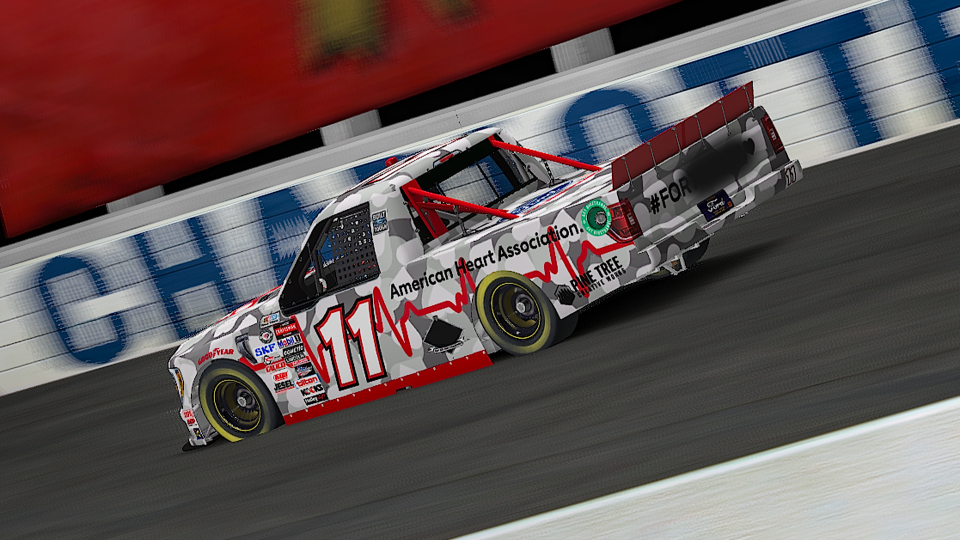 The red on white variant of the #11 for night races. Photo by Alex R.