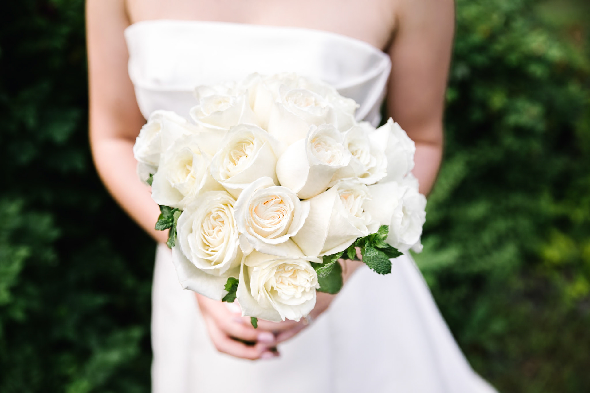 Bride with white bouquet.