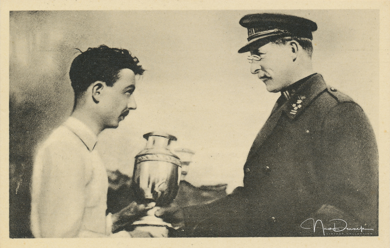 His Majesty Albert I presents the "Schaal Des Konigs 1917-1918" to Ferdinand Wertz, captain of the football team of the 2nd and 22nd Line Regiments (Belgian front on the Yser)