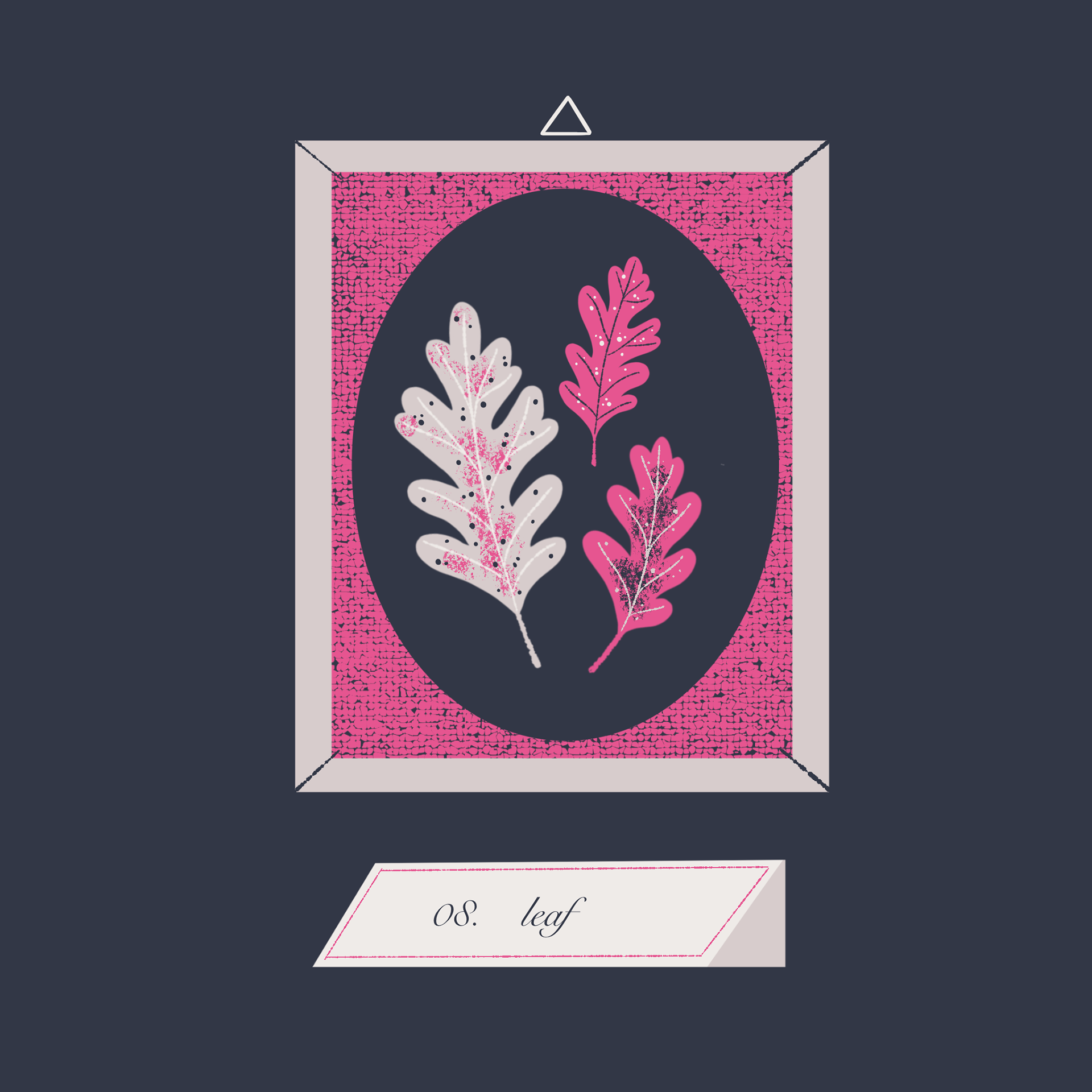 3 pressed leaves set in a gilded frame