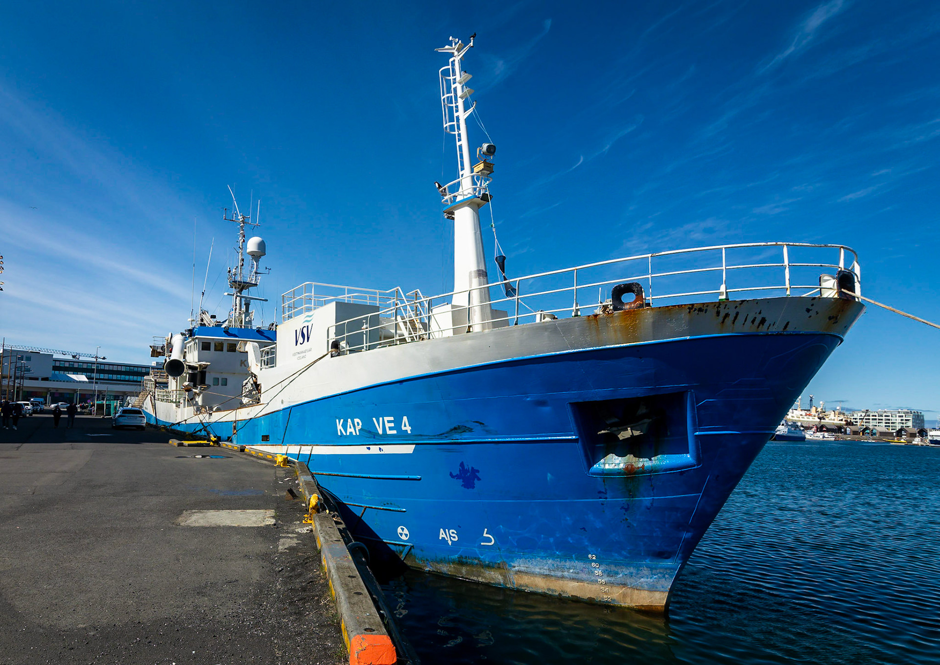 An ocean going fishing vessel sits tide up in Reykjavík Harbour.