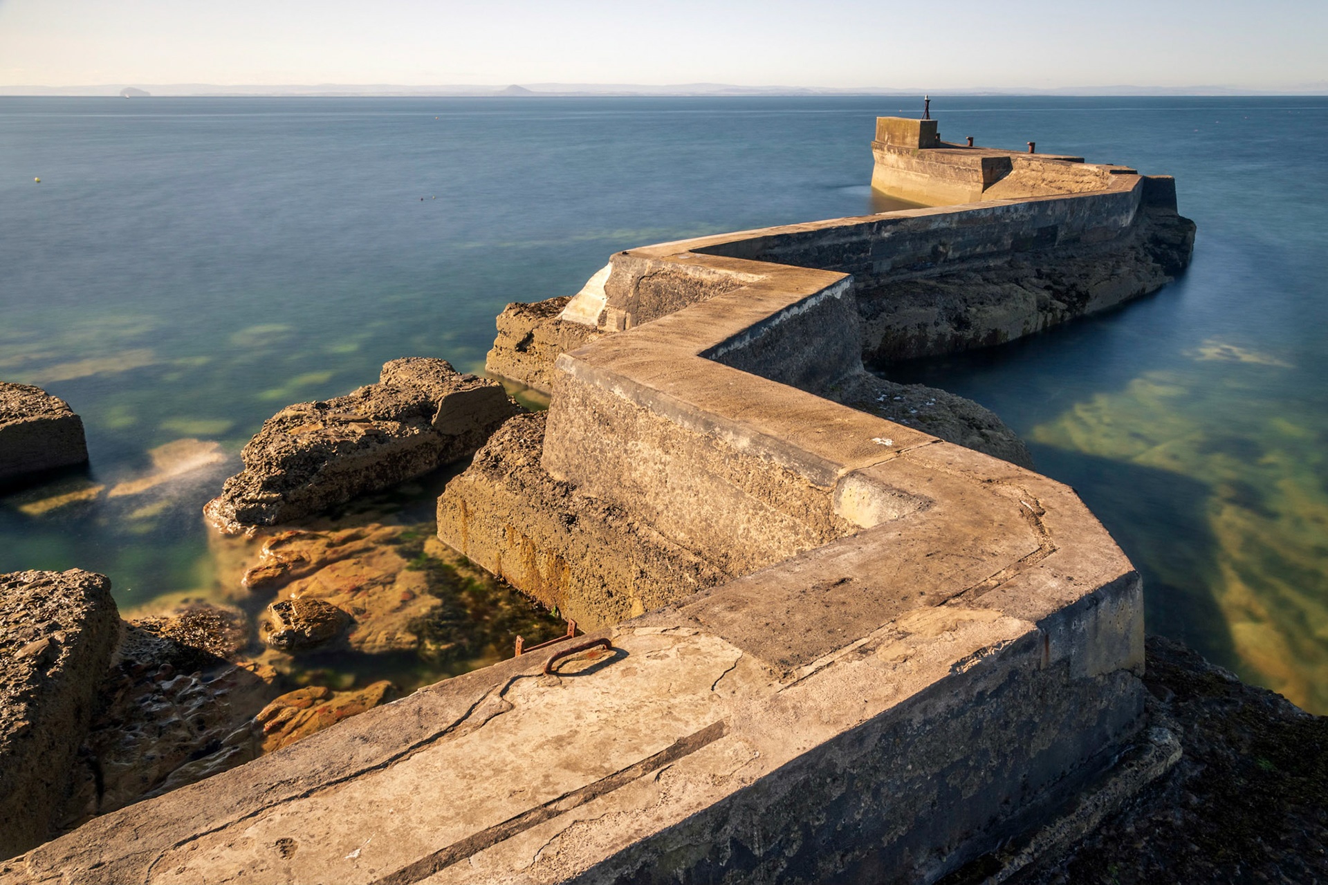 At the Fife Scotland harbor village of Saint Monans the outer sea defences have a zig zag shape.