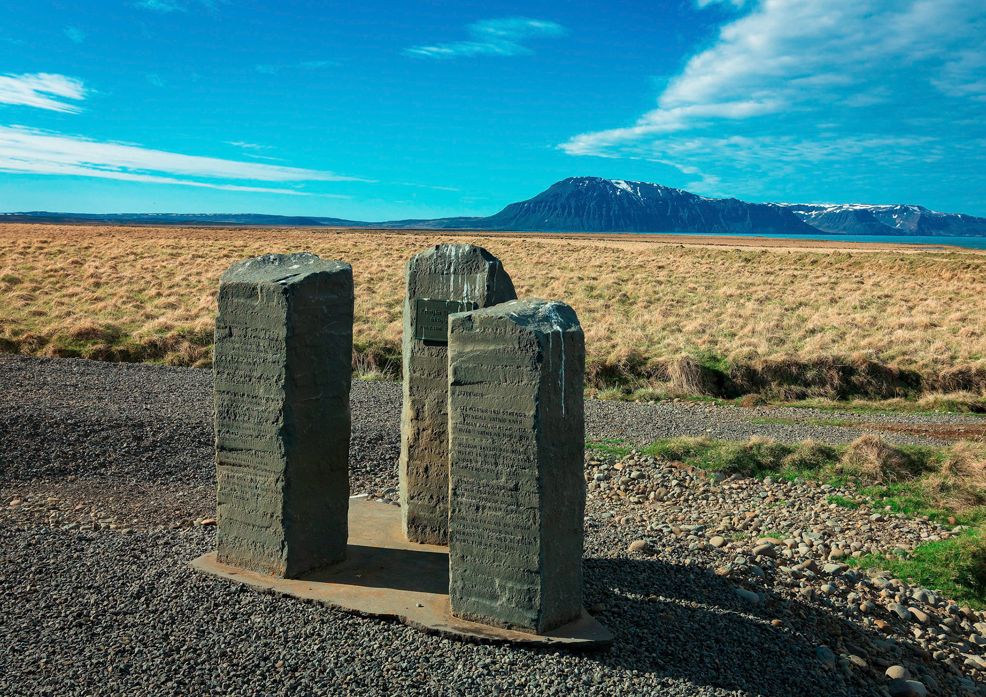 A three pillar memorial to Icelandic poetJónas  Jónas Kristján Einarsson or Christ the Depp whodied in 1994.
