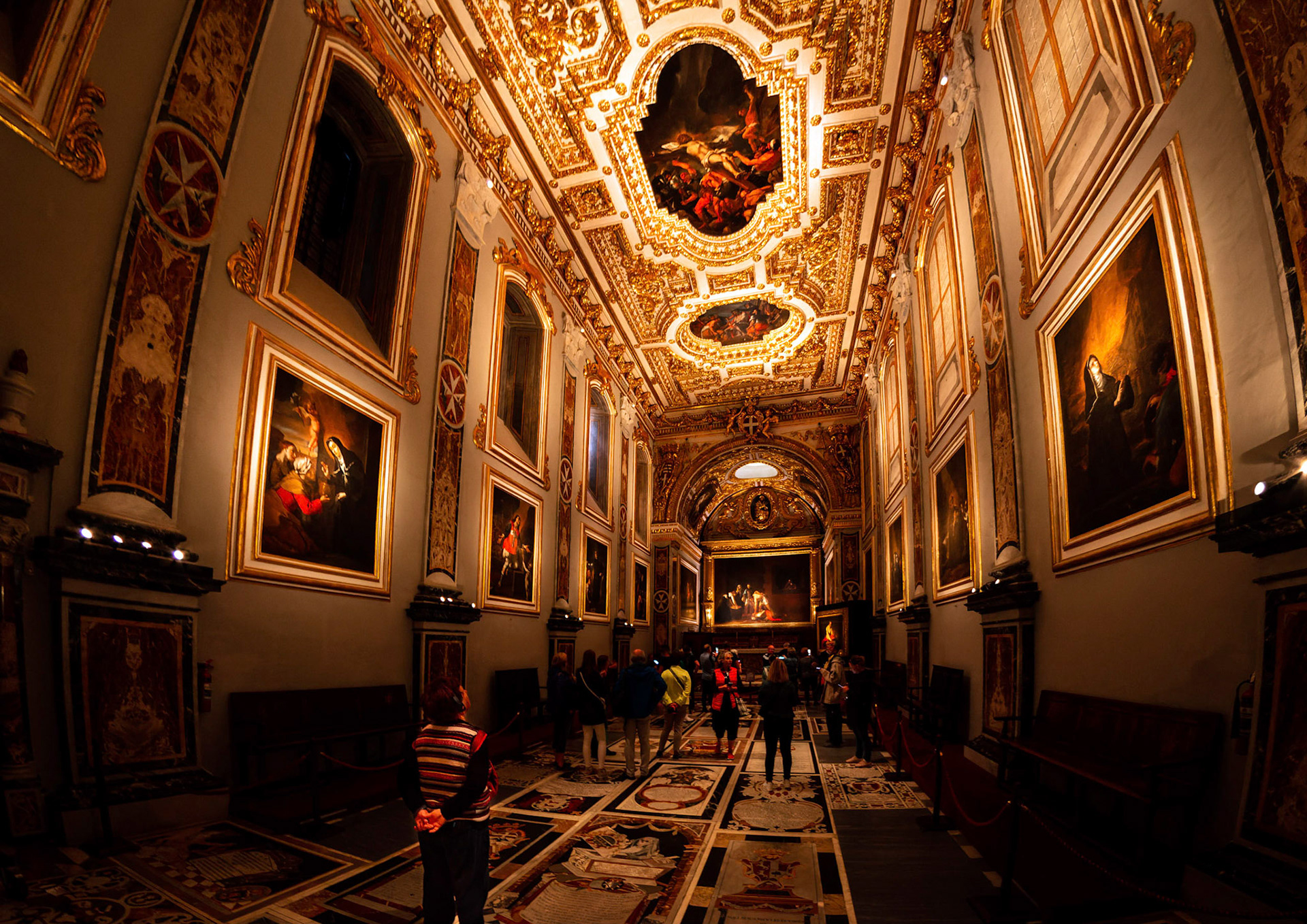 The Oratory of Saint John's Co-Cathedral houses The Beheading of St John the Baptist and Saint Jerome Writing both by Caravaggio. The light in the Oratory is dim to help presserve the paintings.