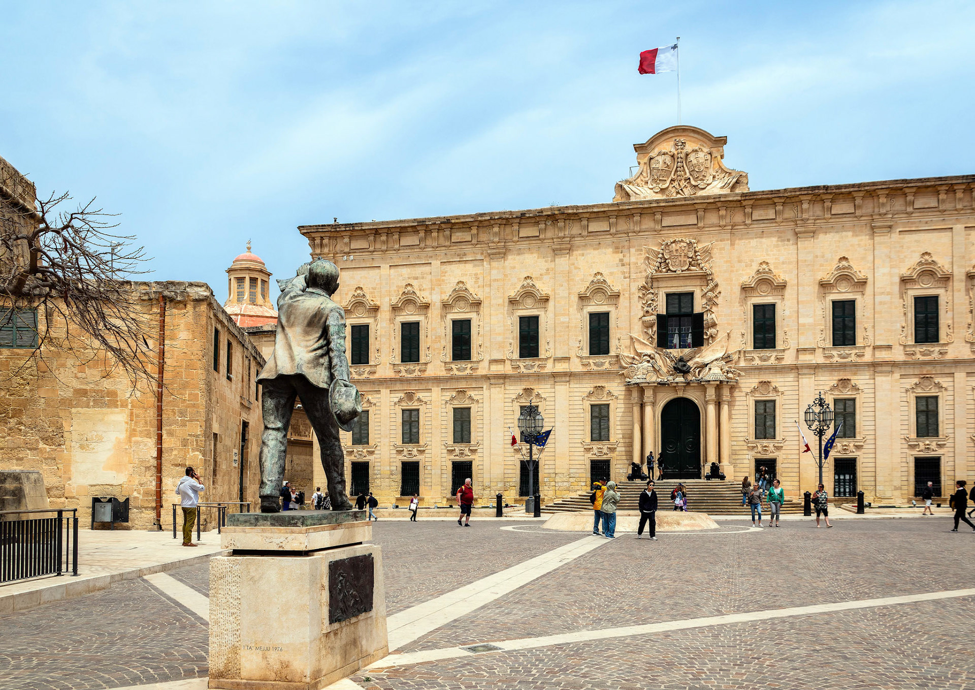 A statue of social revolutionary Manwel Dimech stands outside the Auberge de Castille where the Office of the Prime Minister is located.