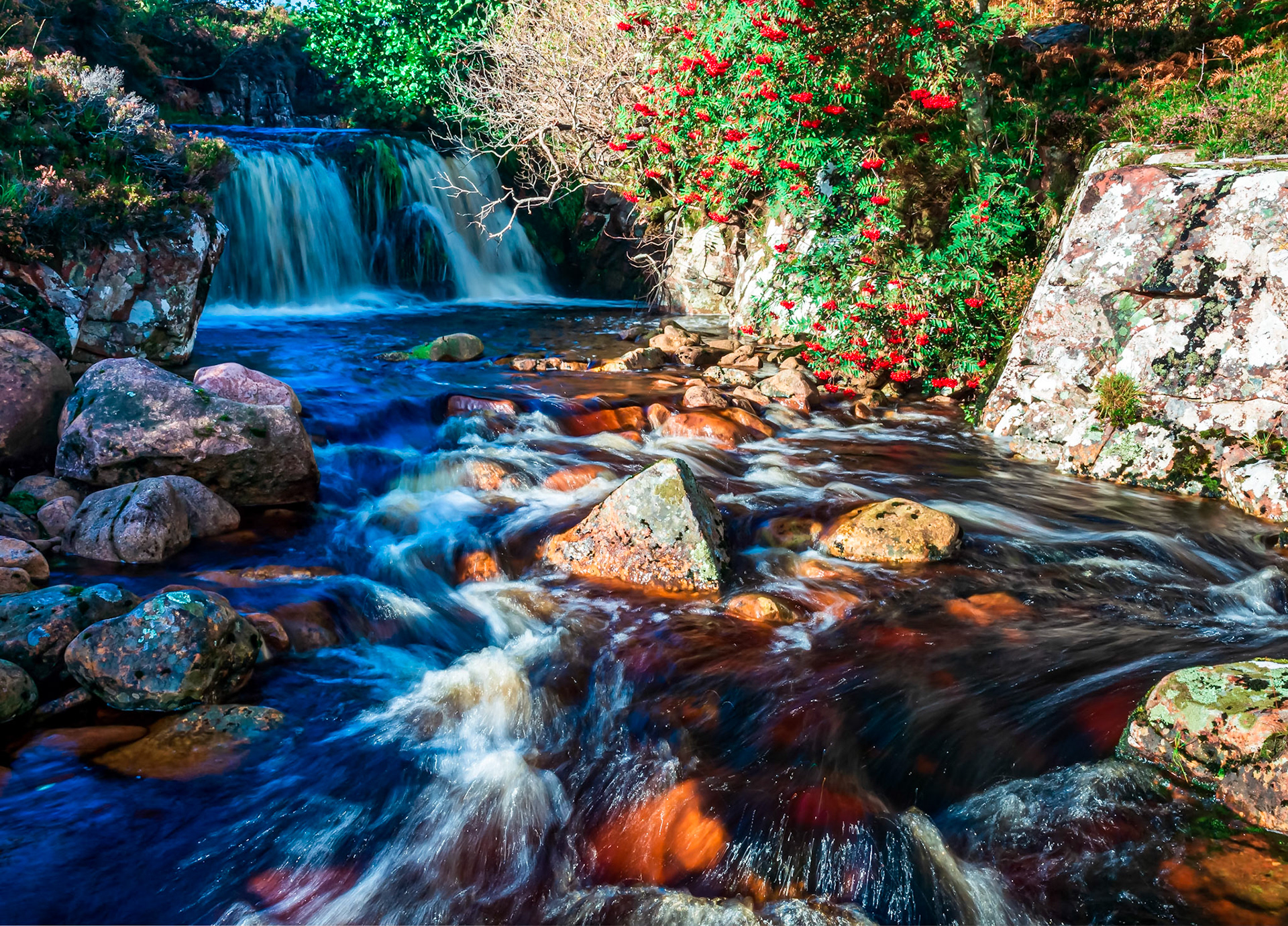 A stream flows down to Horse Sound in the North West of Scotland.