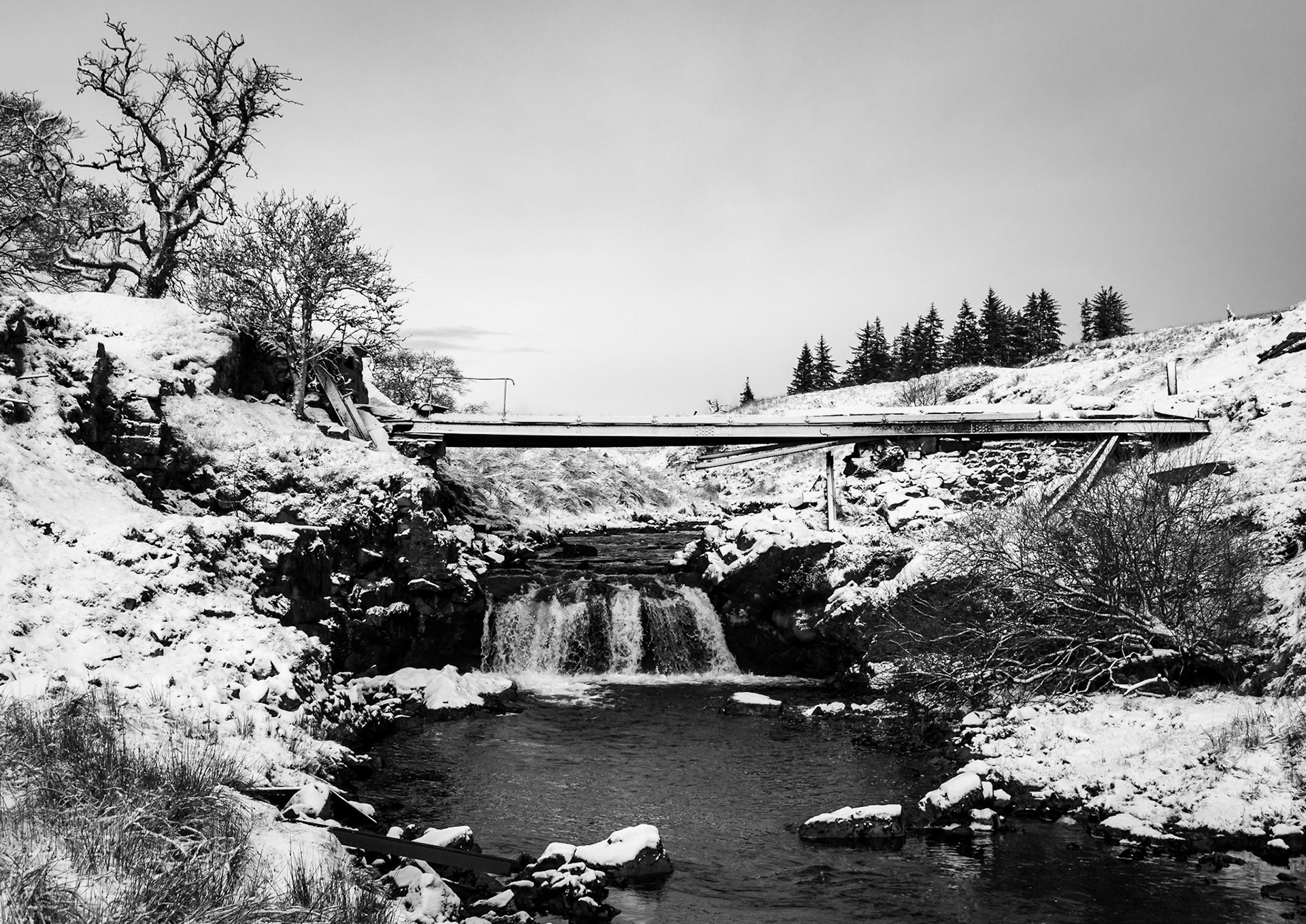 A free flowing River Calder makes its way under a derelict bridge down to the village of Lochwinnoch and then on to Glasgow's River Clyde.