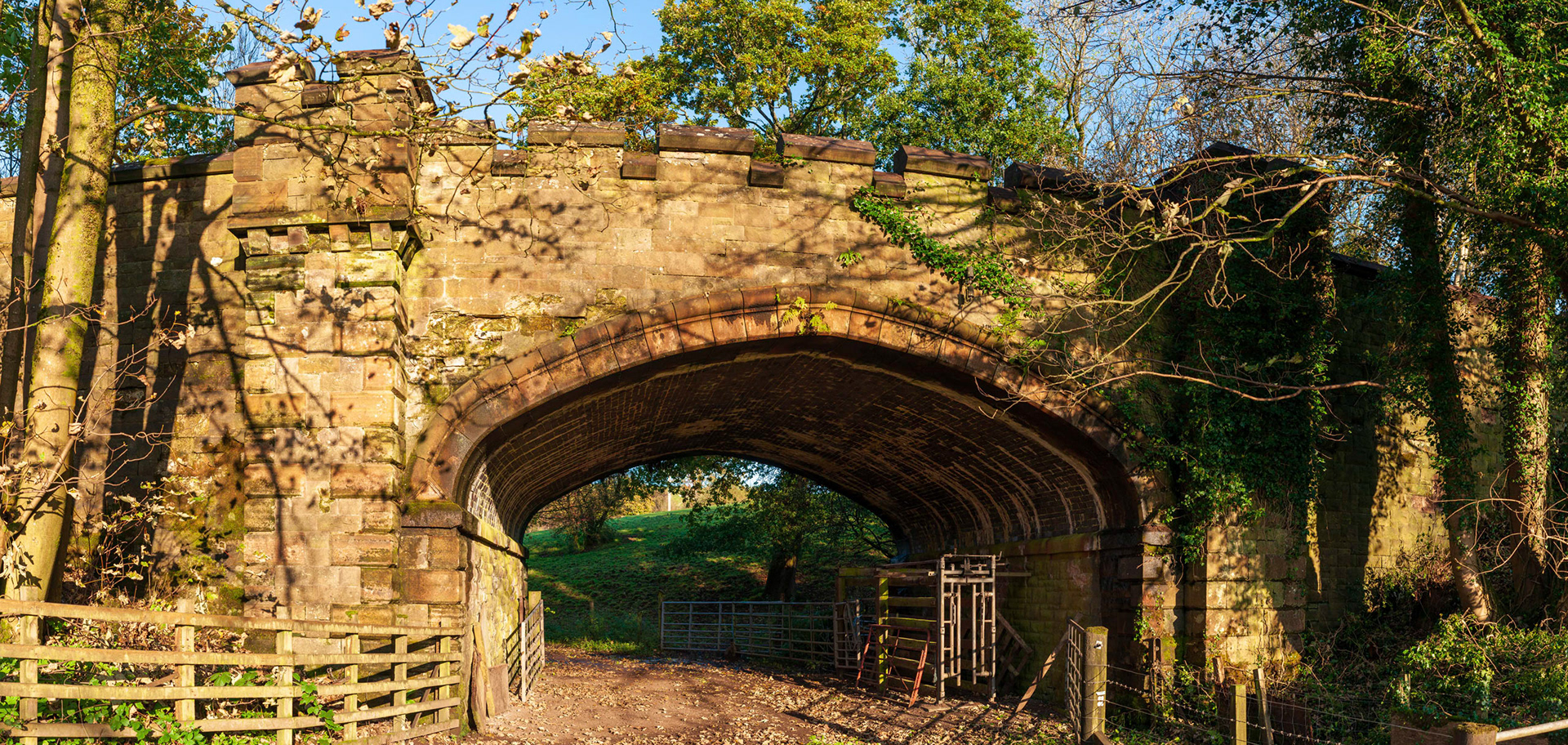 Old Railway Bridge Carrying National Cycle Route 7 over farm track to what was once Castle Semple.