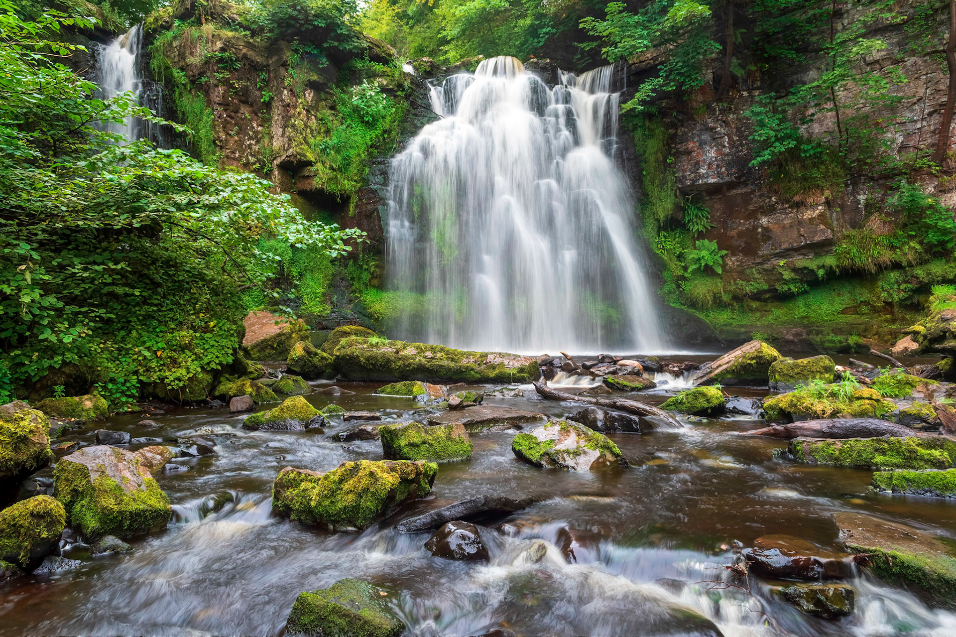 An early morning long exposure of Caaf Water flowing over Lynn Falls near the small North Ayrshire town of Dalry.