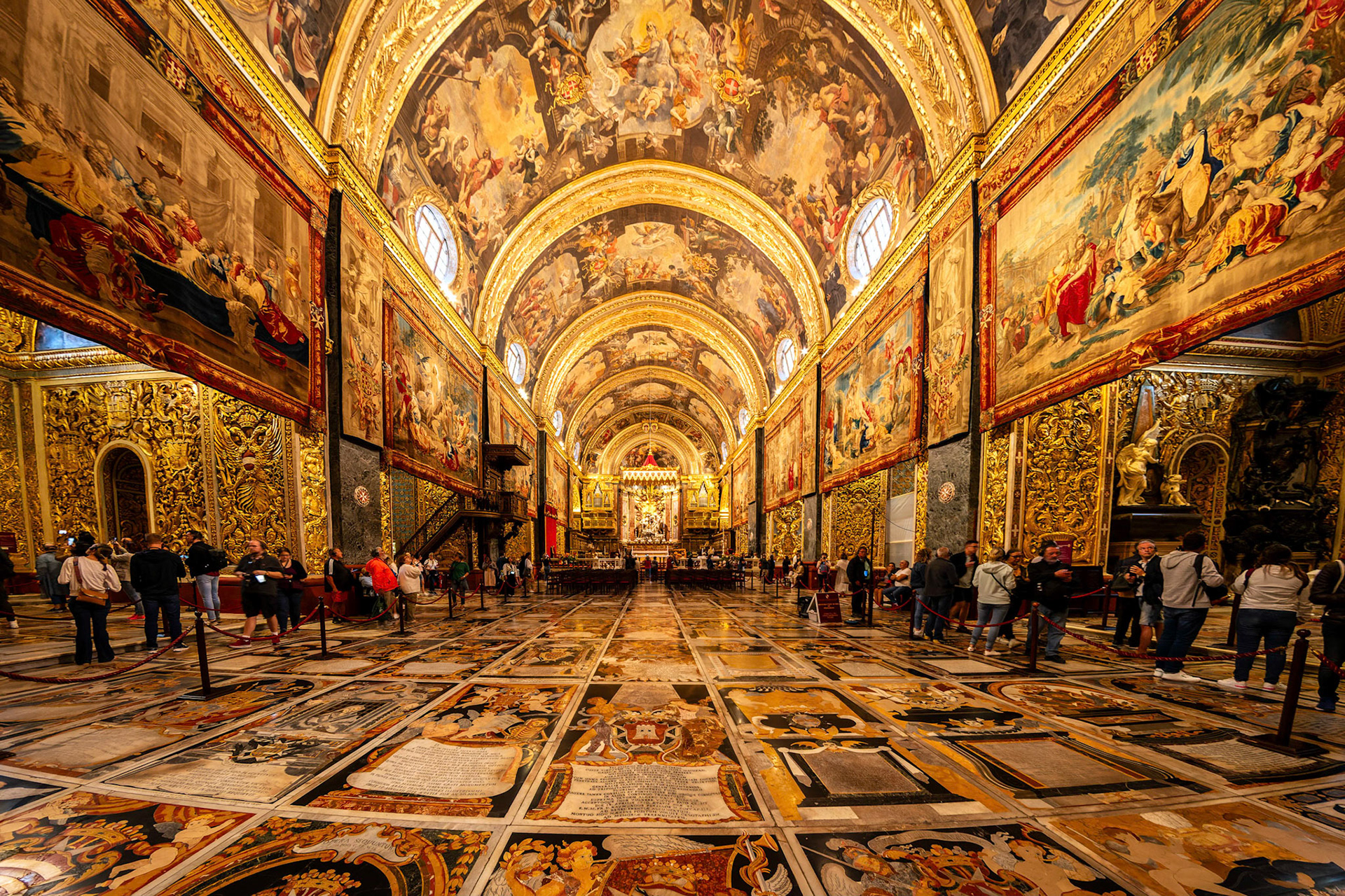 The floor and ceiling of the Nave, Saint John's Co-Cathedral, Valletta, Malta. The marble floor is made up off tombs of Knights and ither officers of the Knights Hospitaller Order.