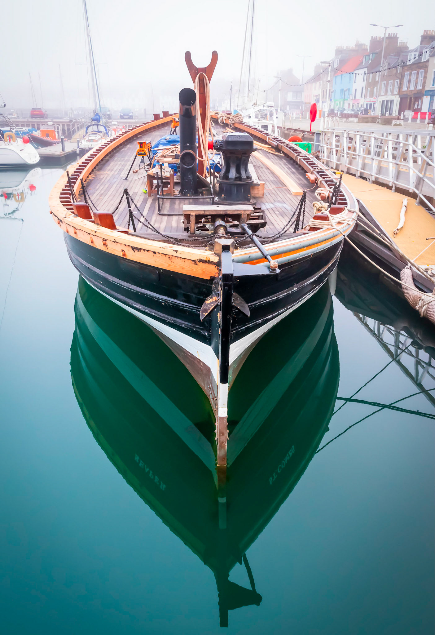 This fishing boat is called 'Reaper' is a restored historic Fifie herring drifter. The boat is presently moored in Anstruther Harbour on the East Coast of Scotland.