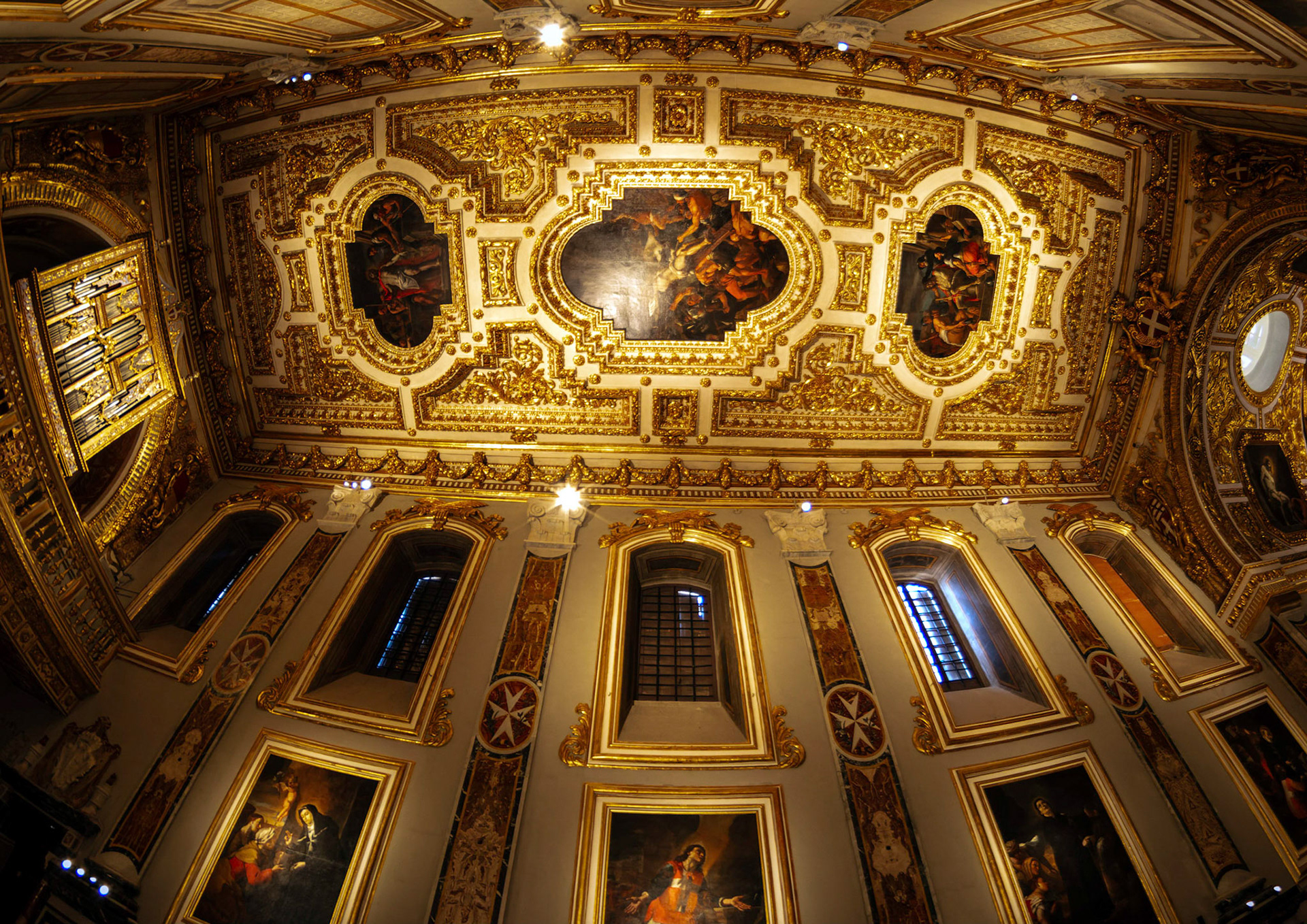 The Oratoryof Saint John's Co-Cathedral houses The Beheading of St John the Baptist and Saint Jerome Writing both by Caravaggio. The light in the Oratory is dim to help presserve the paintings.