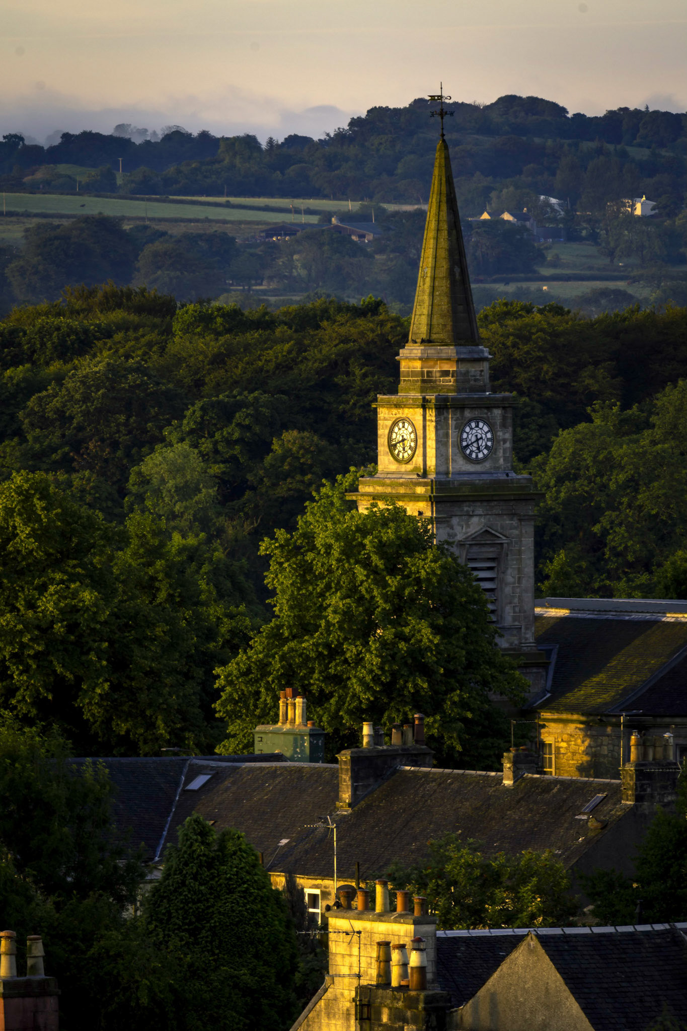 Lochwinnoch Parish Church lit by an early morning sunrise light. Sadly the closure of the church was announced recently.