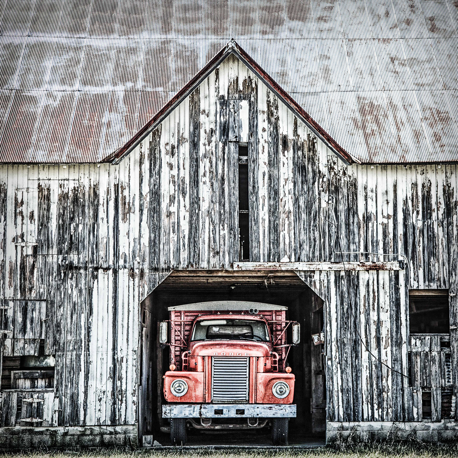 Red Truck in a White Barn
