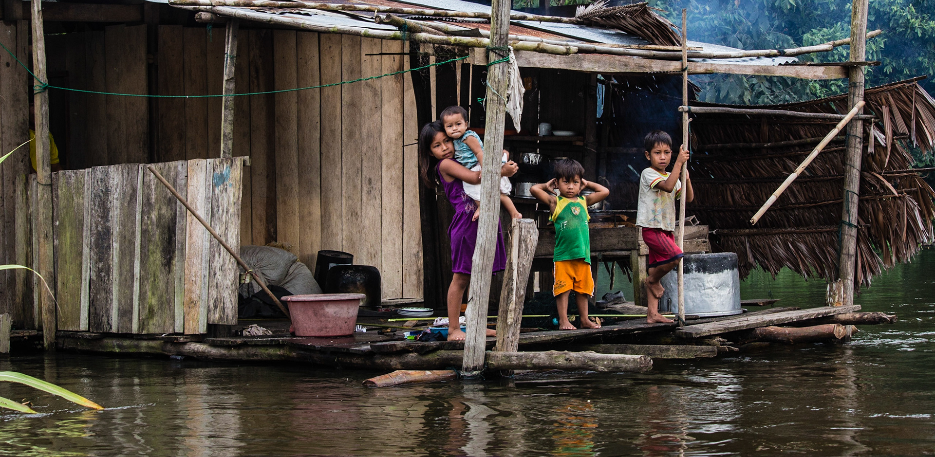 A family of the river. Amazon, Peru.