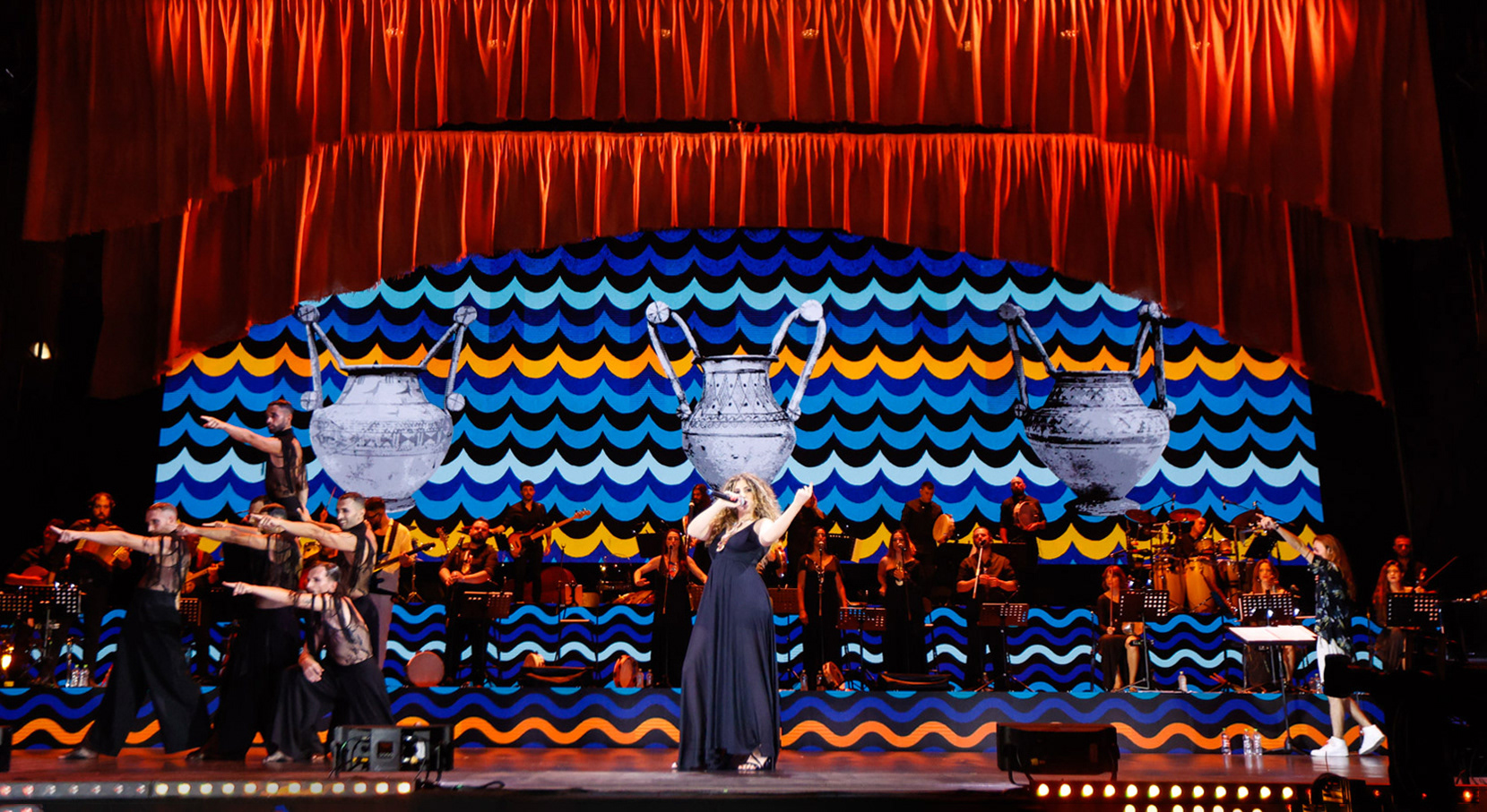 Il palco con le animazioni create per i visual della 25° edizione de La Notte della Taranta, l’importante festival di musica popolare tradizionale salentina.