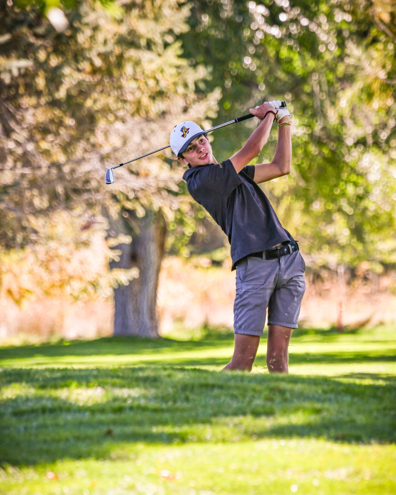  Junior Max Zadvorny swings his golf club at the 5A State Golf Tournament in Colorado Springs. Zadvorny helped lead Arapahoe to take first place in the state at the tournament and he placed 8th individually at the competition.