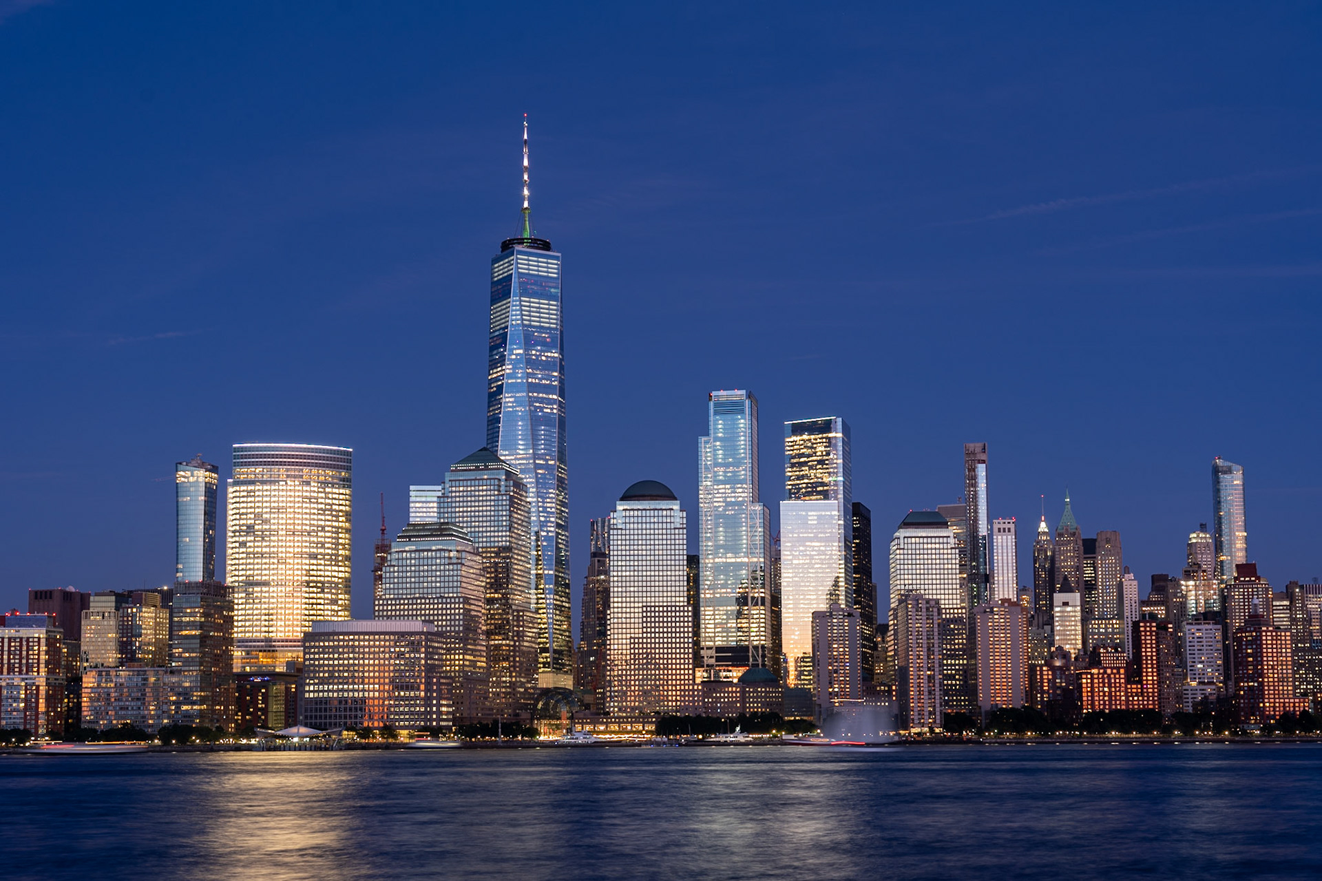 New York City, United States - September 18, 2019: Lower Manhattan skyline at night. View from Jersey City.