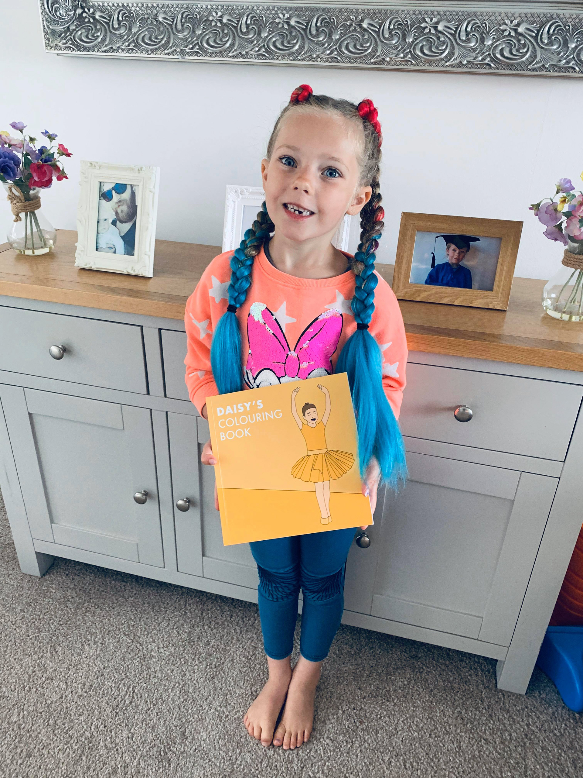 Daisy with her book