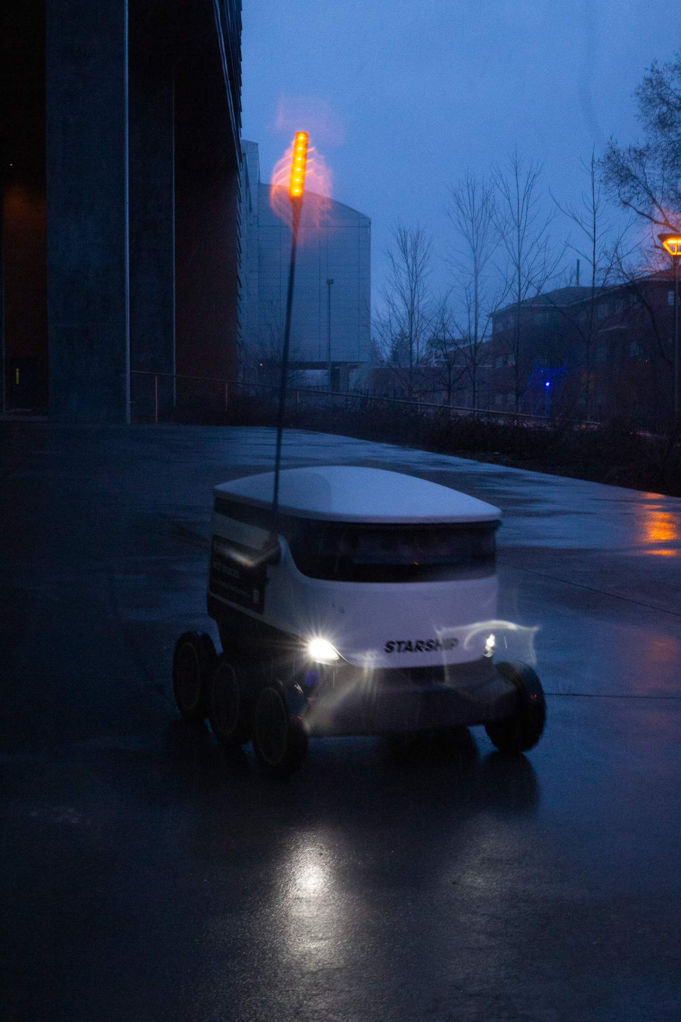A Starship robot departs from the Science and Health building, March 7. 