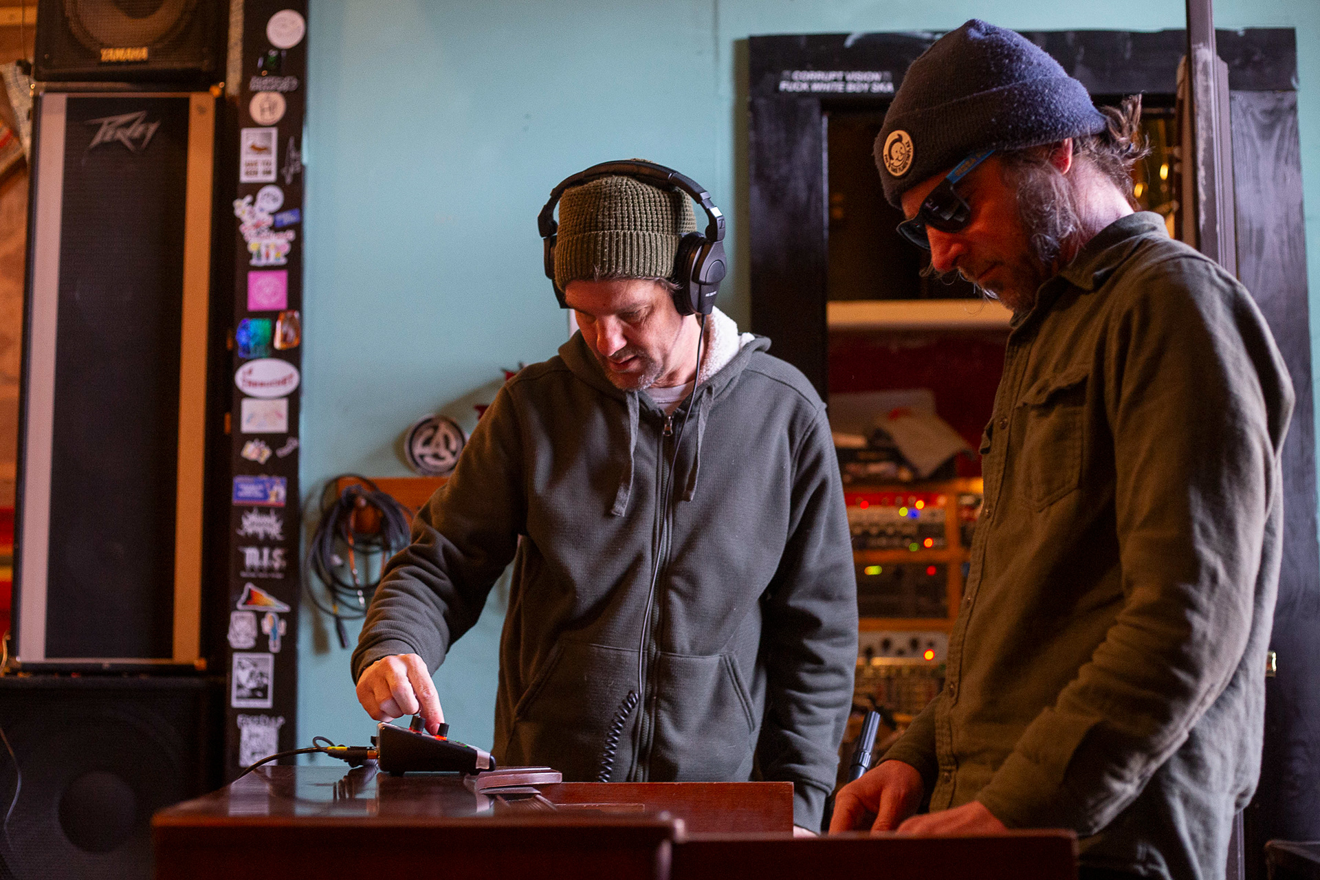 Triple A Sound Solutions audio engineers Andrew Baker (left) and Andrew Grosse (right) record music at The Hive, March 7.
