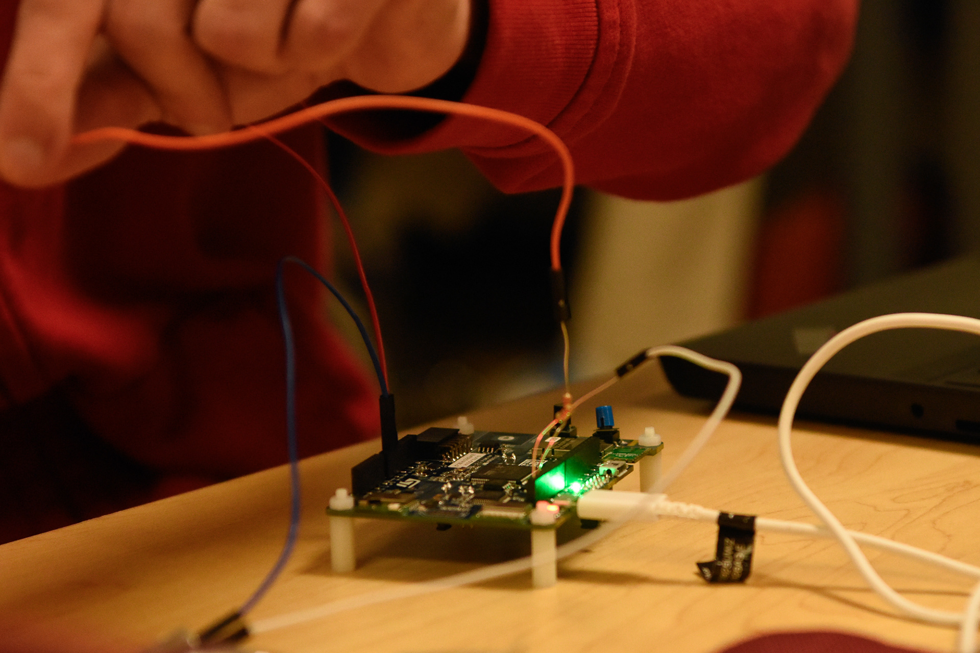 Engineering student J. Johnson wires a circuit for a microelectronics class in the Engineering Building, Feb. 21.