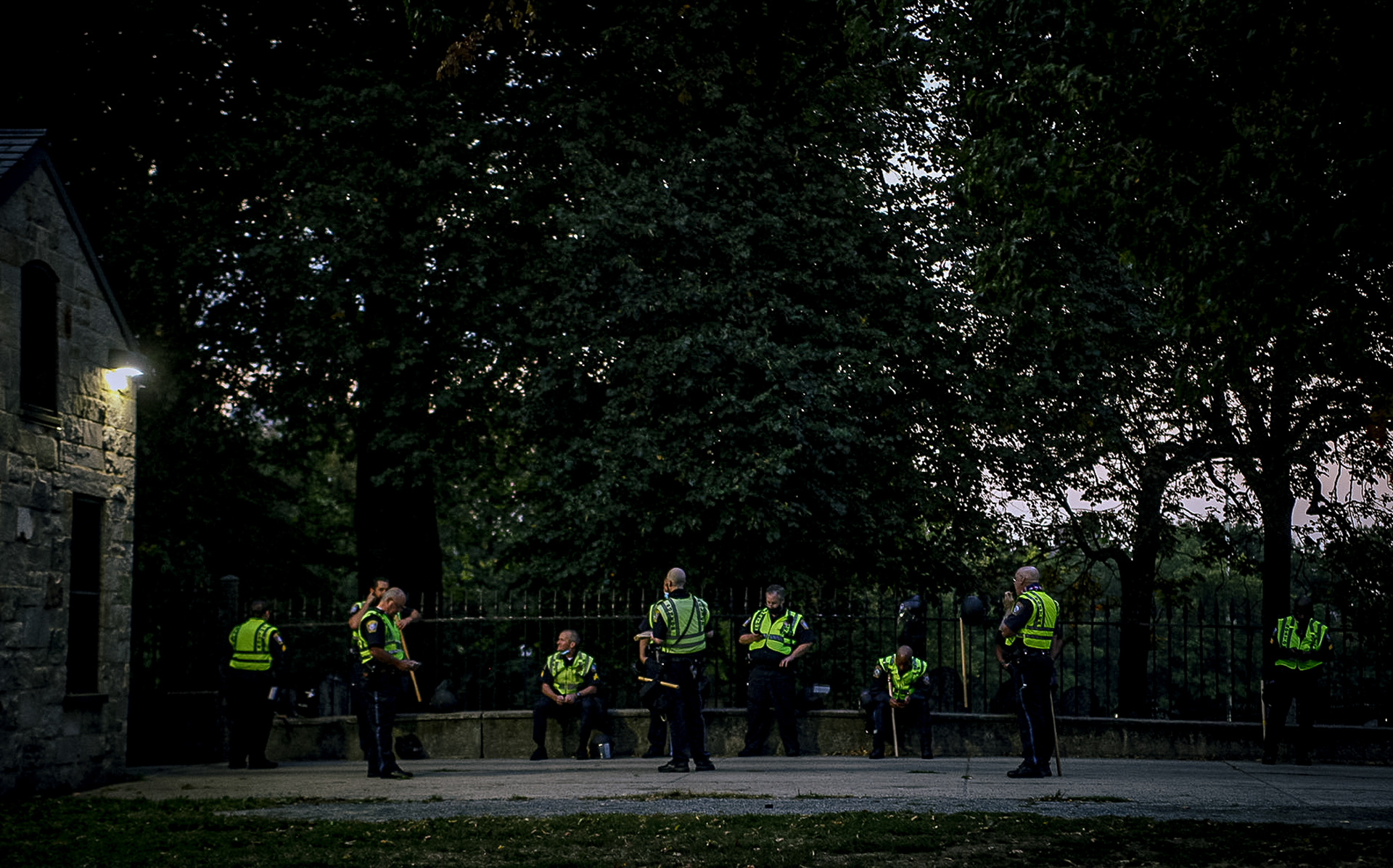 Officers line up in the Boston Common preparing for a night of potential protests following Black Lives Matter unrest in Boston on Sept. 25, 2020.