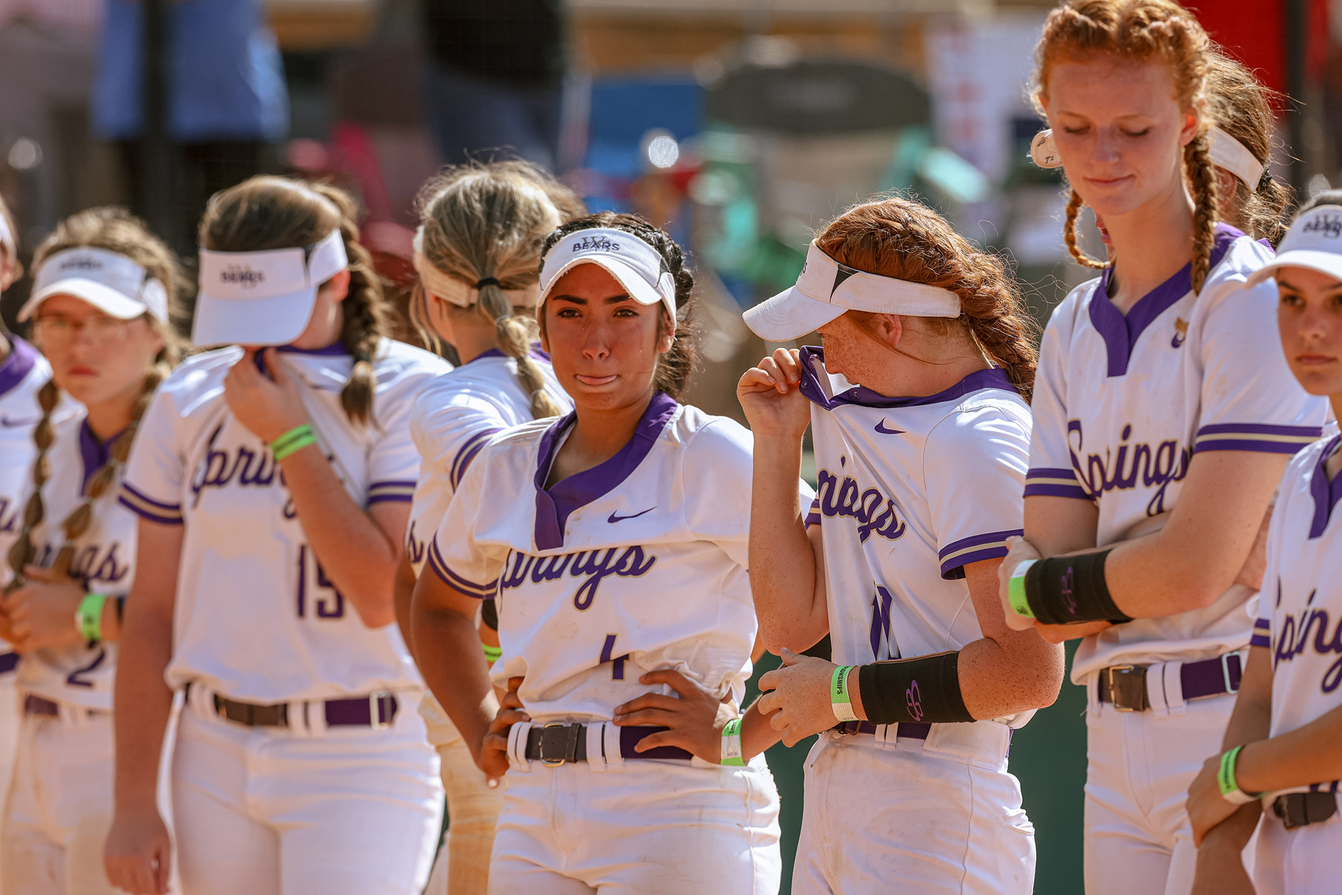 Players on the Winter Springs High varsity softball team cry as they line up to receive their second-place trophy after the FHSAA softball state championships on Saturday, May 22, 2021. The team lost 0-5 to Doral Academy in Clermont, Fla. For Orlando Sentinel