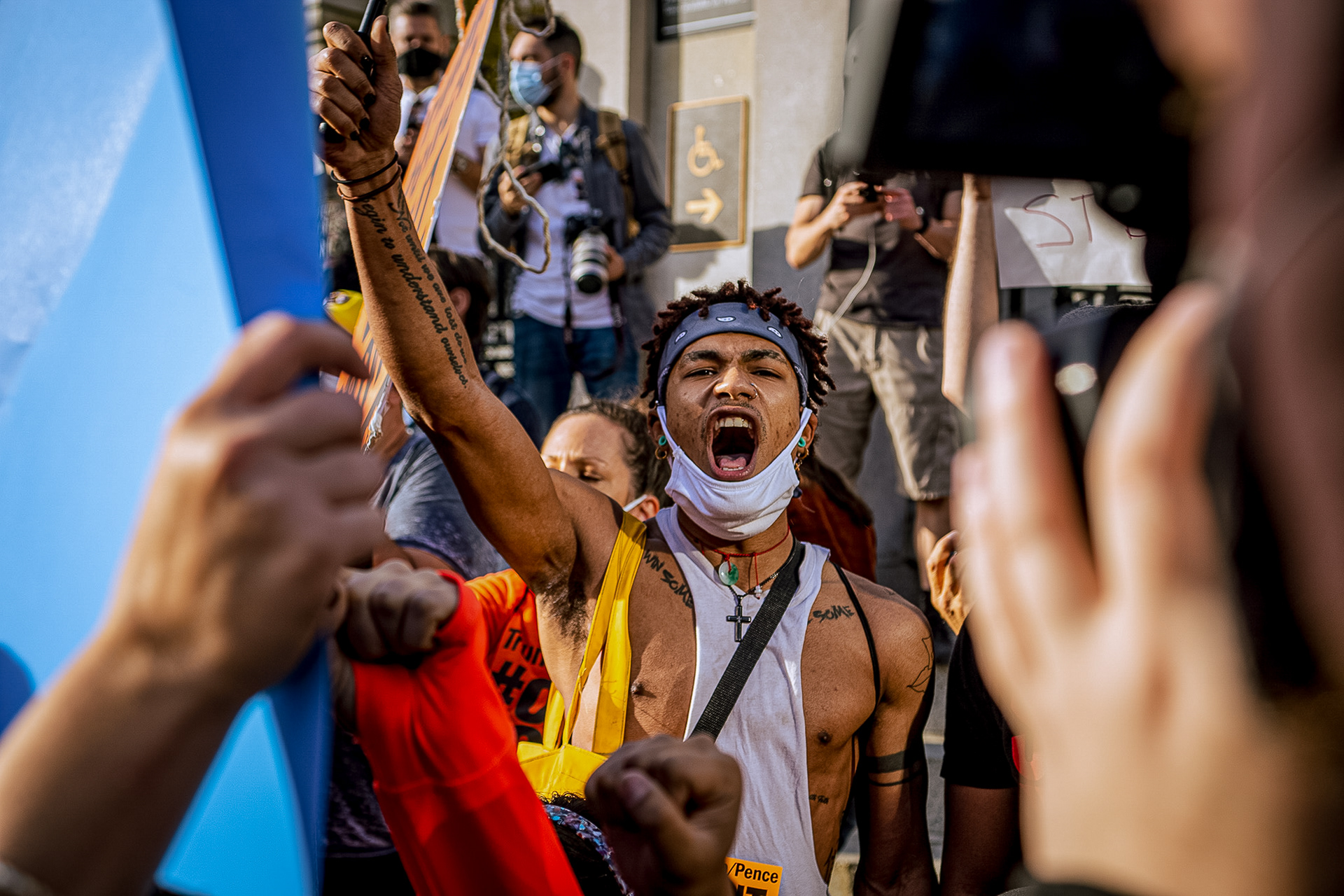 A man yells in celebration as news breaks that Joe Biden won the 2020 presidential election in Boston on November 7, 2020.