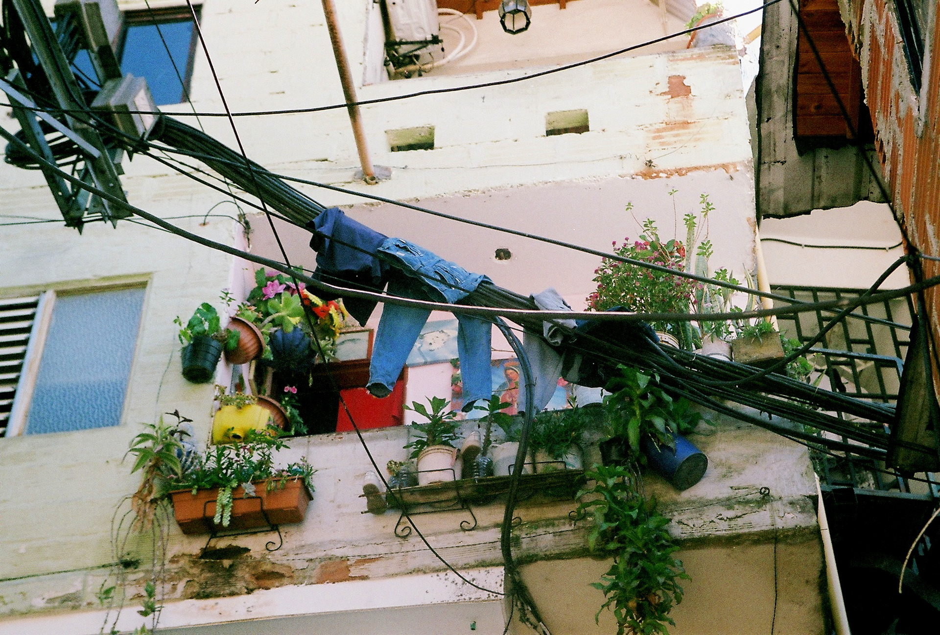 Clothes hang to dry on wires in Medellin, Colombia. 2022.